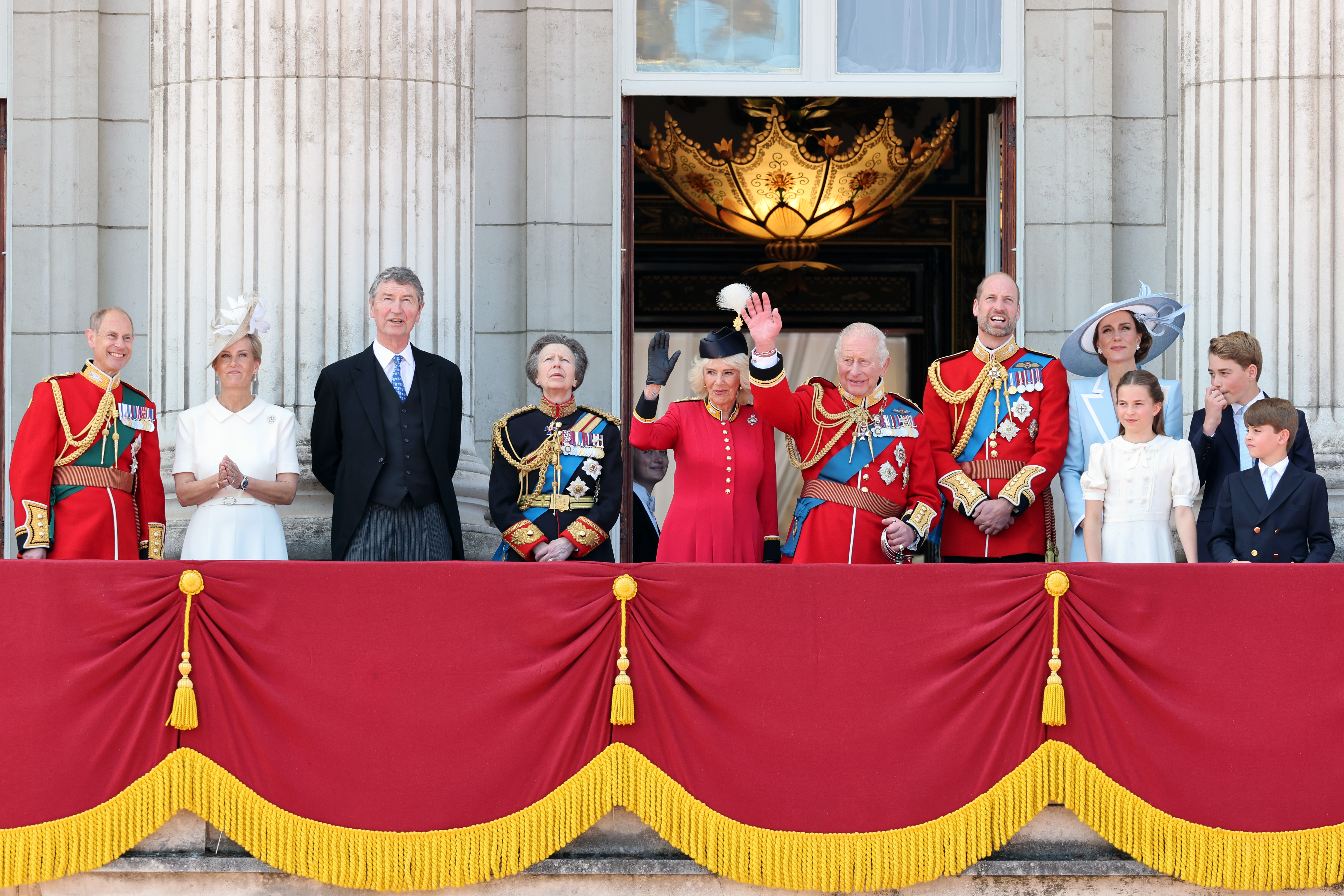 King Charles III and other working members of the Royal Family appeared on the Buckingham Palace balcony for Trooping the Colour in June 2026. Harry and Meghan's return to Britain did not bring them back into that group of working royals. | Source: Getty Images