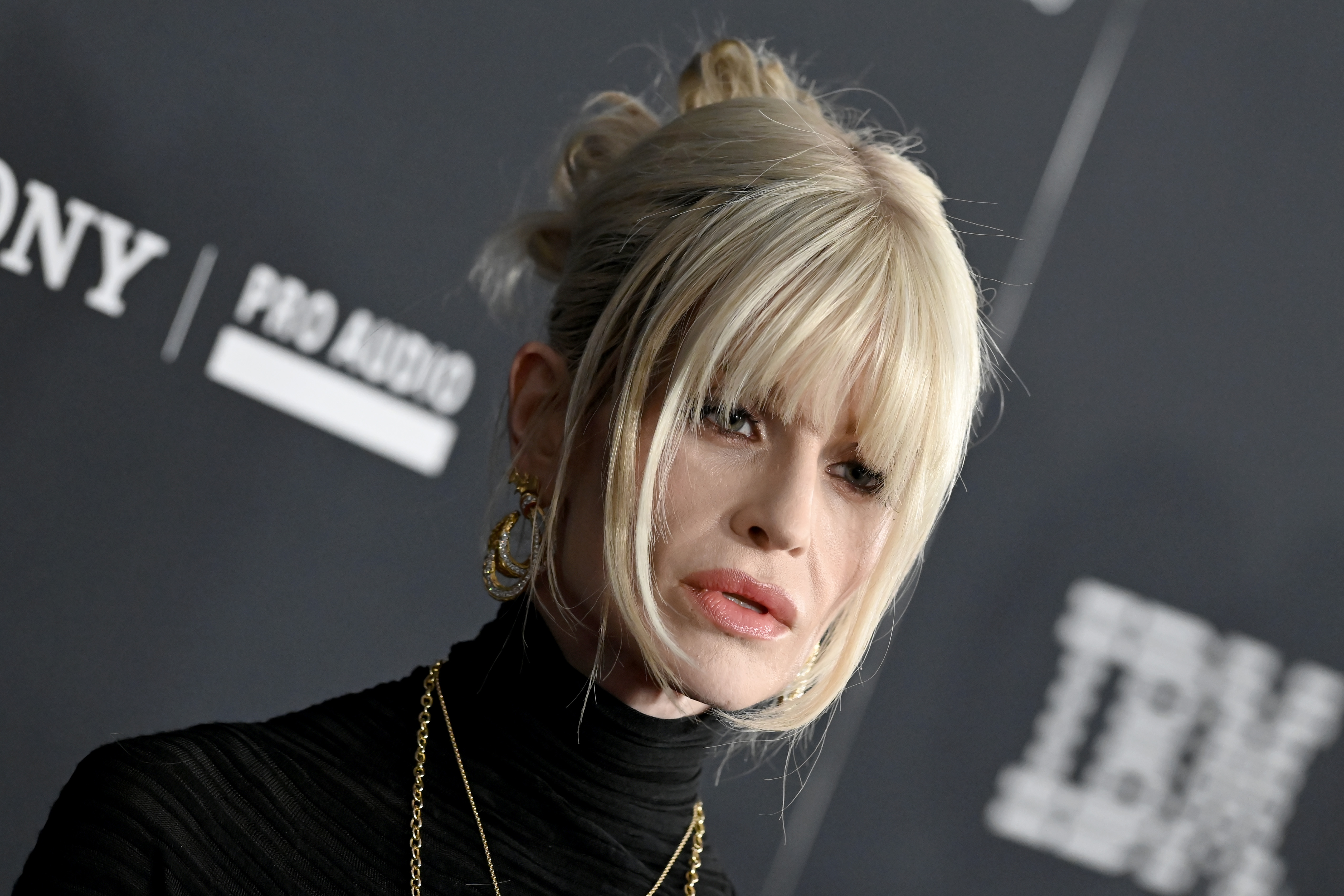 Kelly Osbourne poses on the red carpet at the 68th Grammy Awards pre-Grammy gala at The Beverly Hilton in Beverly Hills on January 31, 2026. | Source: Getty Images