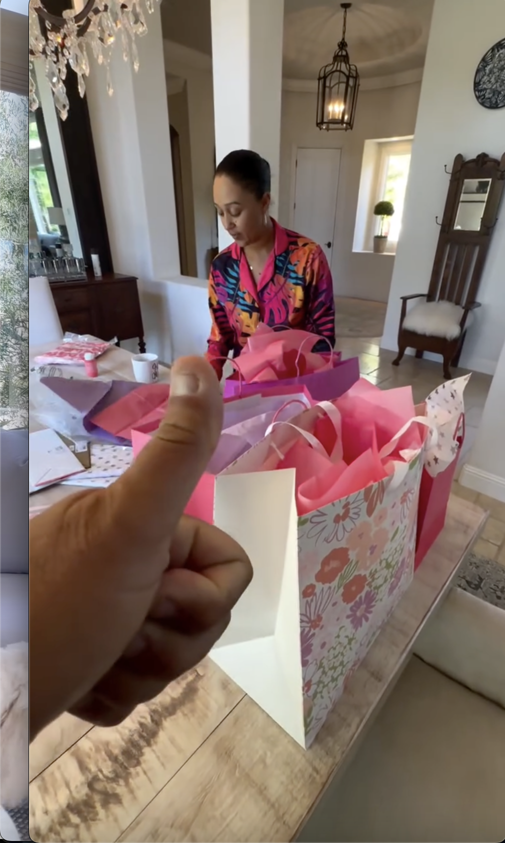 Tamera Mowry working on something in her home, posted on July 2, 2025. | Source: Instagram/tameramowrytwo