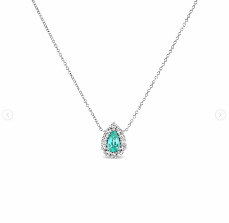 The matching necklace featured a pear-shaped blue Paraíba tourmaline framed by diamonds and suspended from a delicate chain. | Source: Instagram/stonedfinejewelry