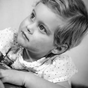 Olivia Newton-John as a little girl. [Photo timeline: 1948 (year she was born) to 1966 (childhood to teenage era)]. | Fun Fact: Music wasn't Olivia's only childhood ambition: she once wanted to become a veterinarian. Concerned that she wouldn't make it through the necessary science exams, however, she ultimately turned toward the other passion that had followed her since childhood — performing. | Source: Instagram/therealonj
