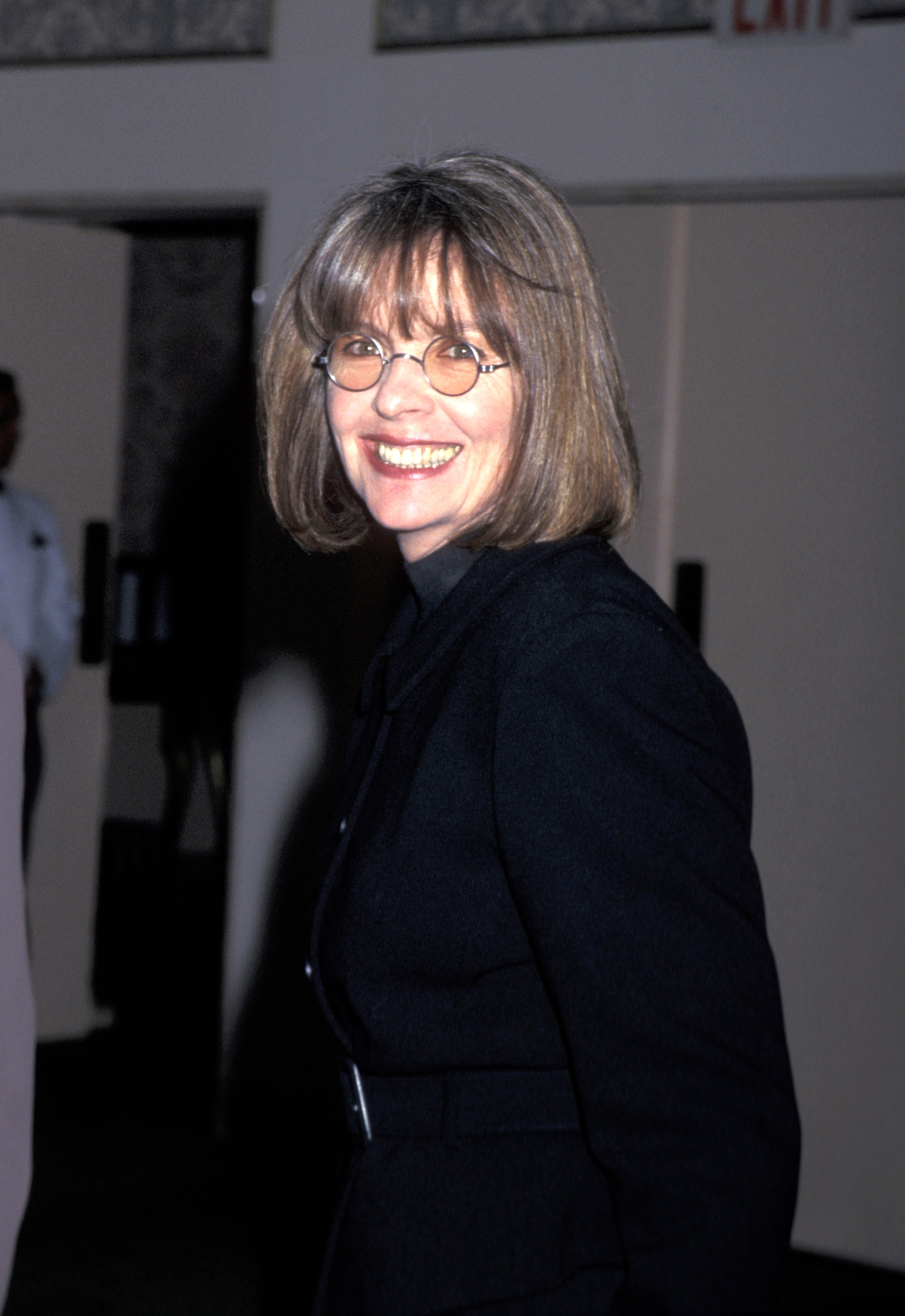 Diane Keaton attends the Muse Awards at the New York Hilton Hotel, turning toward the camera while walking through the venue | Source: Getty Images