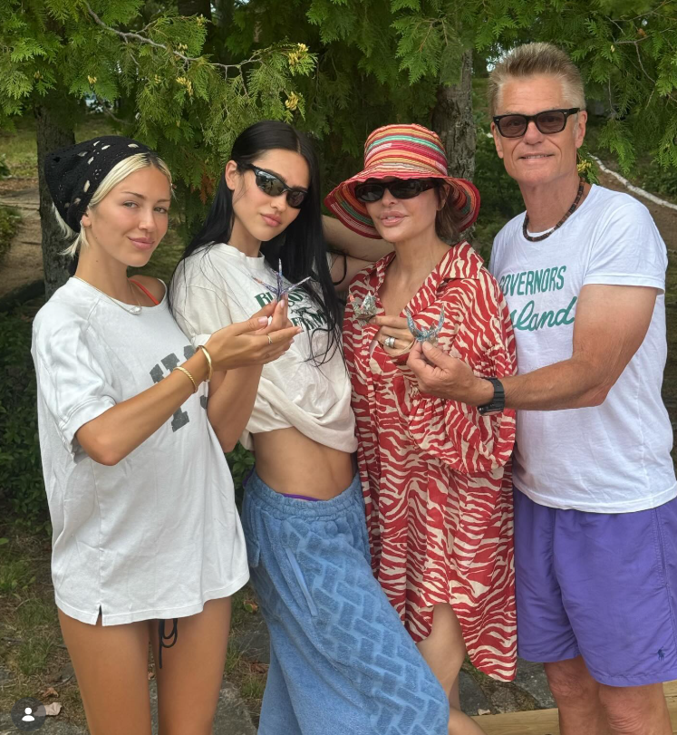 Lisa Rinna, Harry Hamlin, Delilah Belle Hamlin and Amelia Gray Hamlin pose in vacation clothes on August 9, 2024 | Source: Instagram/lisarinna