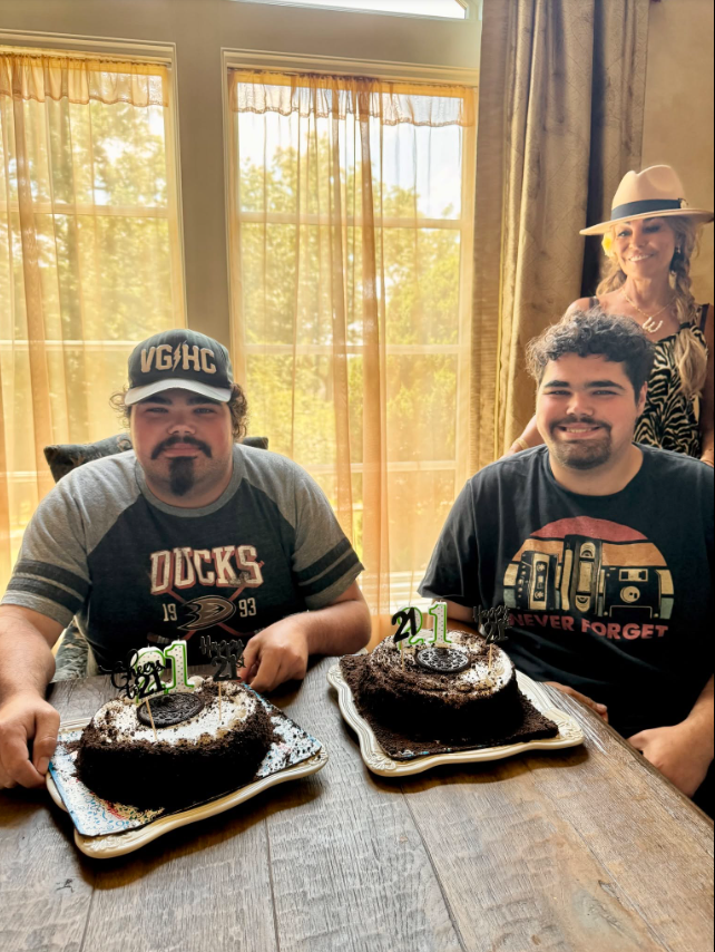 With matching birthday cakes in front of them and Wanda Miller smiling proudly in the background, Justin and Jordan marked their 21st birthday together, looking every bit like the grown men fans had watched mature over the years. | Source: Facebook/Kenny Rogers