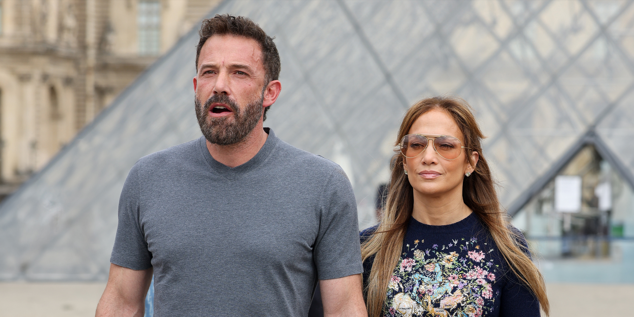 Ben Affleck and Jennifer Lopez walk together at the Louvre Museum on July 26, 2022 in Paris, France. | Source: Getty Images