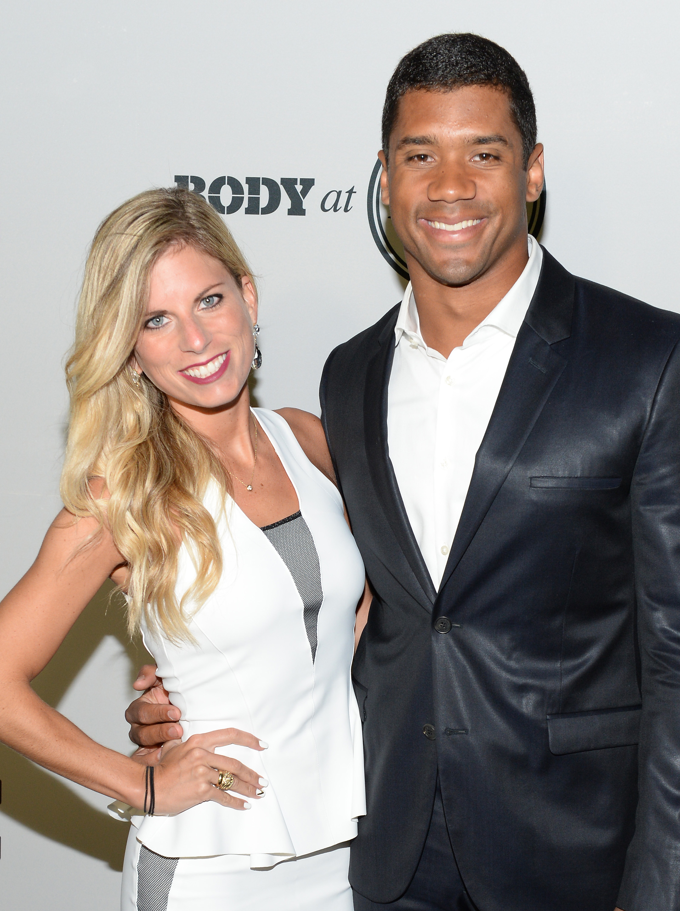 Russell Wilson and Ashton Meem attend ESPN the Magazine 5th annual "Body Issue" party at Lure on July 16, 2013 in Hollywood, California. | Source: Getty Images