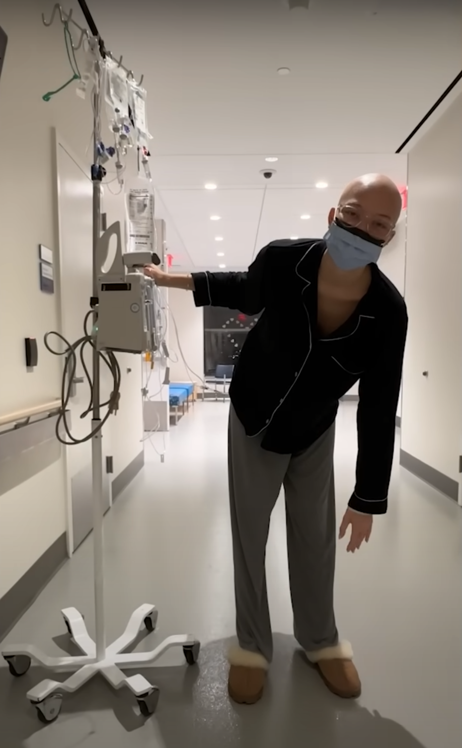 Isabella Strahan walks beside an IV pole while undergoing cancer treatment in 2024. | Source: YouTube/@IsabellaStrahan