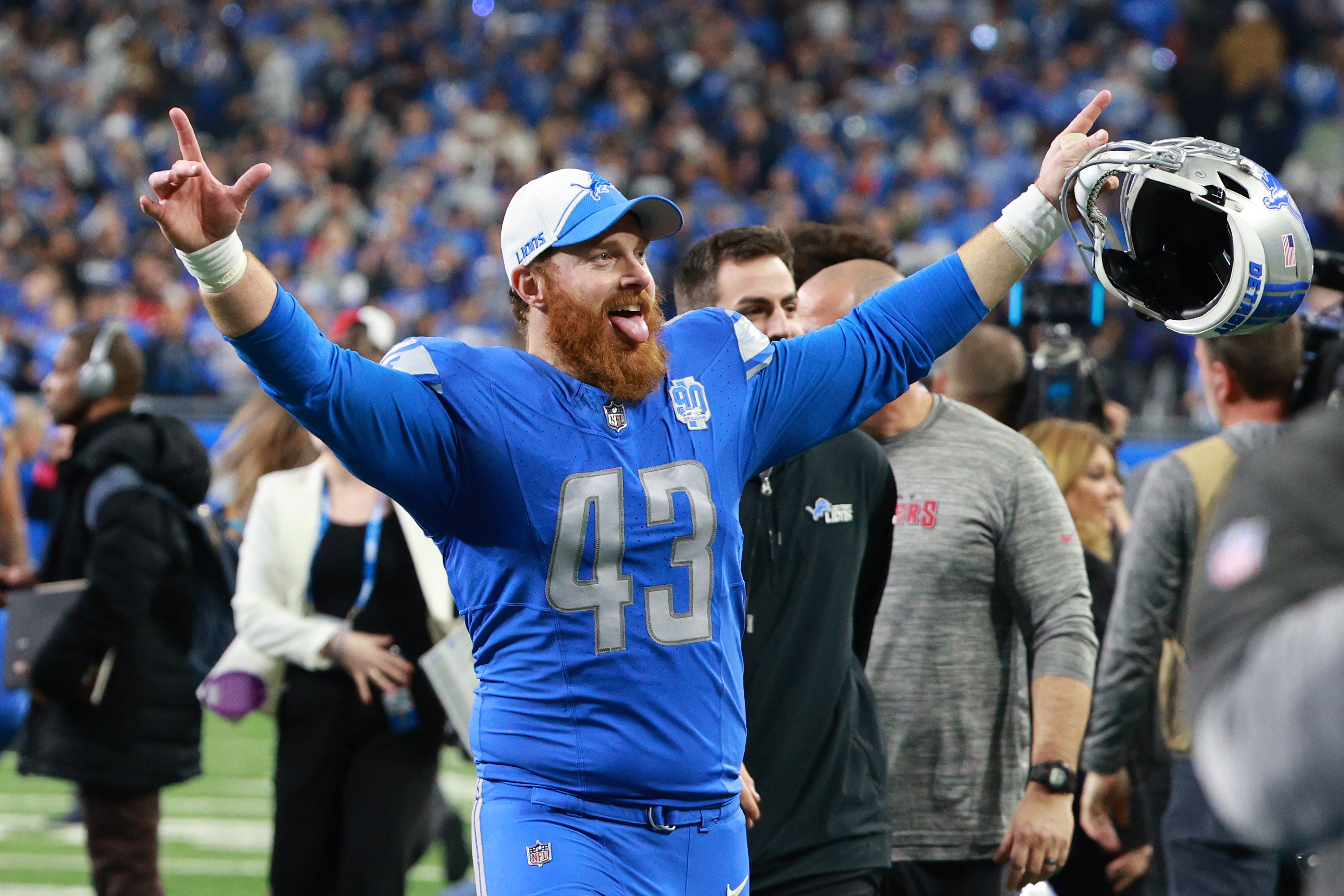Jake McQuaide walks off the field in Detroit, Michigan on January 21, 2024 | Source: Getty Images
