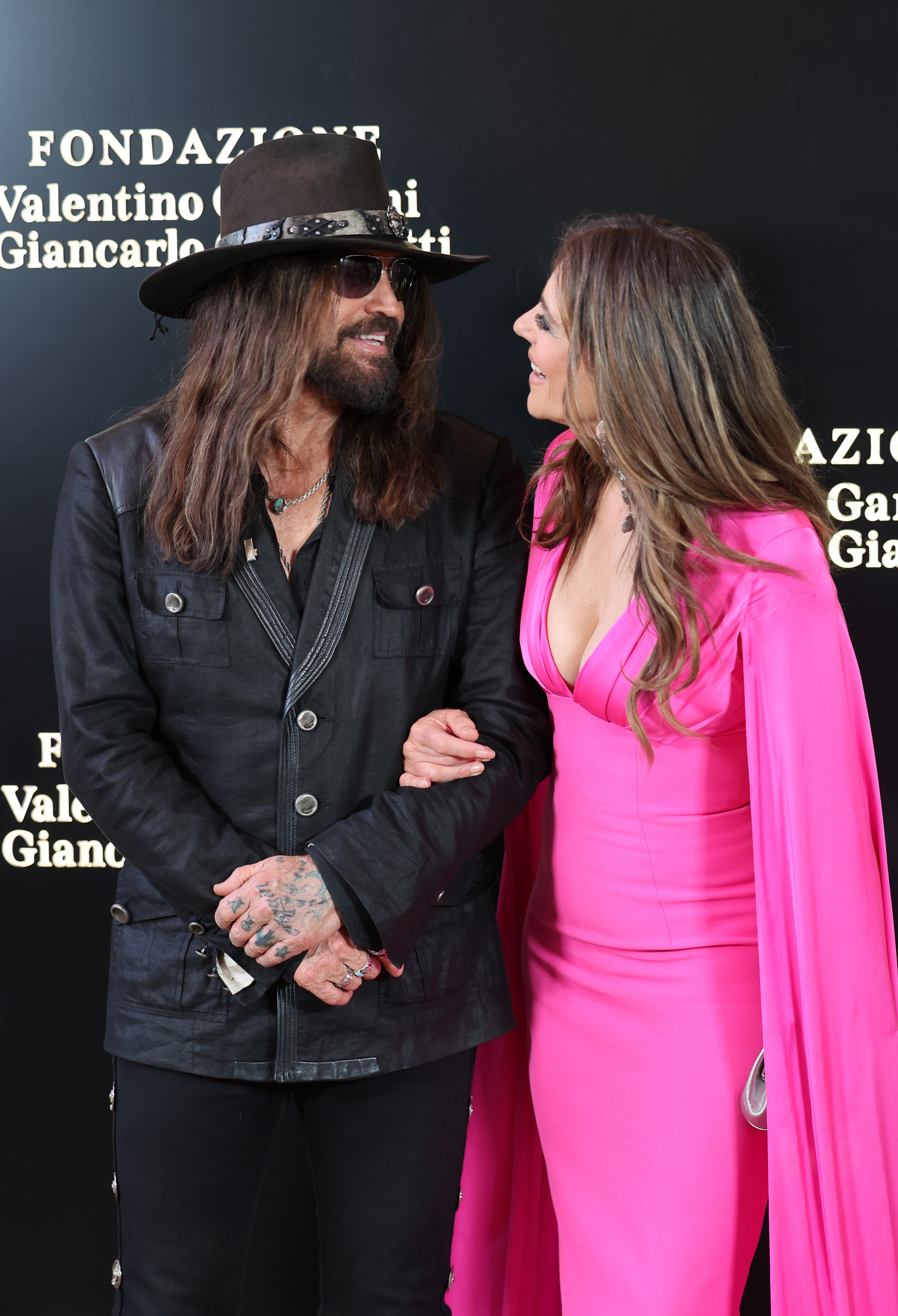 Billy Ray Cyrus and Elizabeth Harley pictured at the "Orizzonti | Rosso" Exhibition Opening Dinner on May 24, 2025, in Rome, Italy. | Source: Getty Images