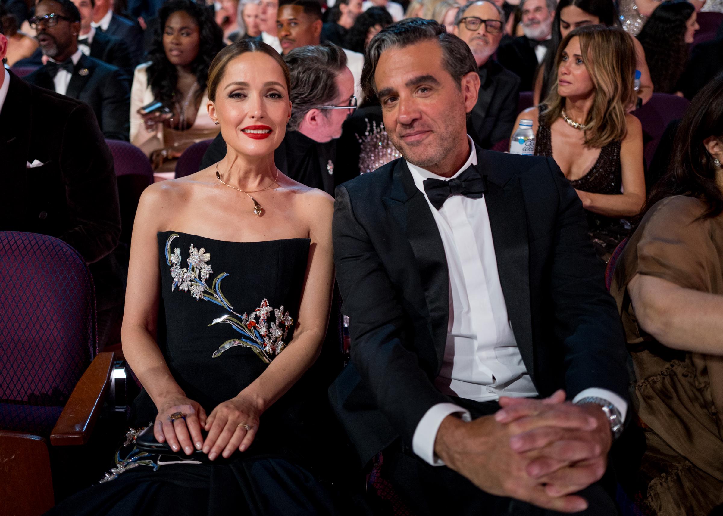 Rose Byrne and Bobby Cannavale sit together during the 98th Oscars in Hollywood California on March 15, 2026. | Source: Getty Images