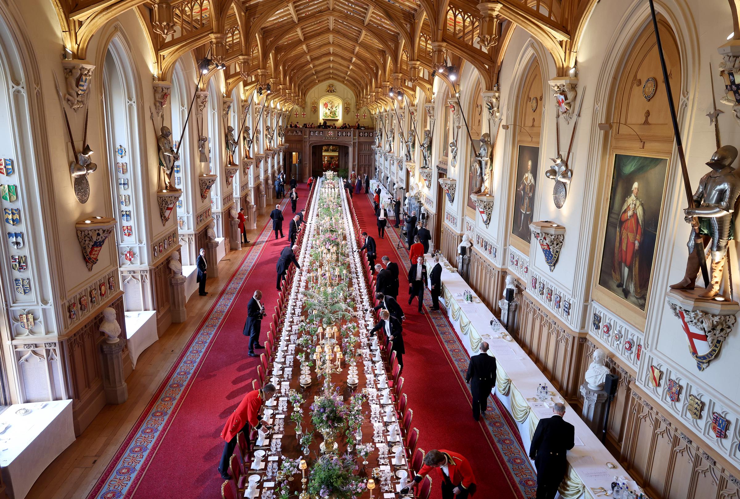 The majestic hallway of the banquet hall in Windsor Castle, west London. The royal staff is getting the hall ready for the banquet that housed several dignitaries, royalties, and international diplomacies, including Emmanuel Macron and his wife Brigitte.
