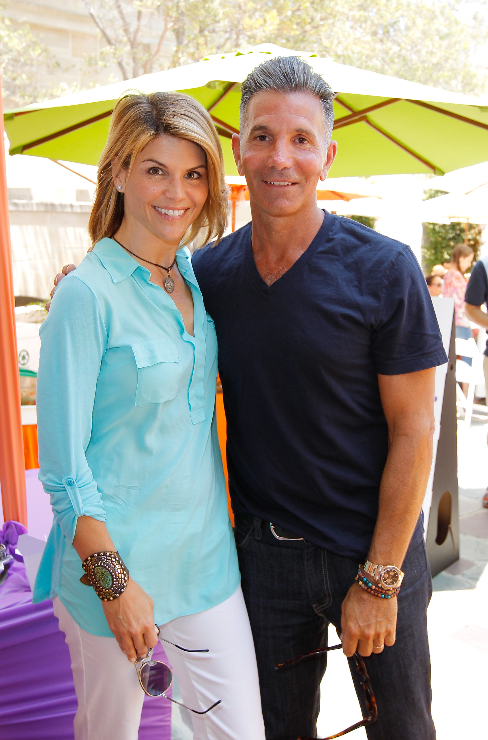 Lori Loughlin and Mossimo Giannulli attend the 6th Annual Kidstock Music and Arts Festival at Greystone Mansion in Beverly Hills, California on June 3, 2012 | Source: Getty Images