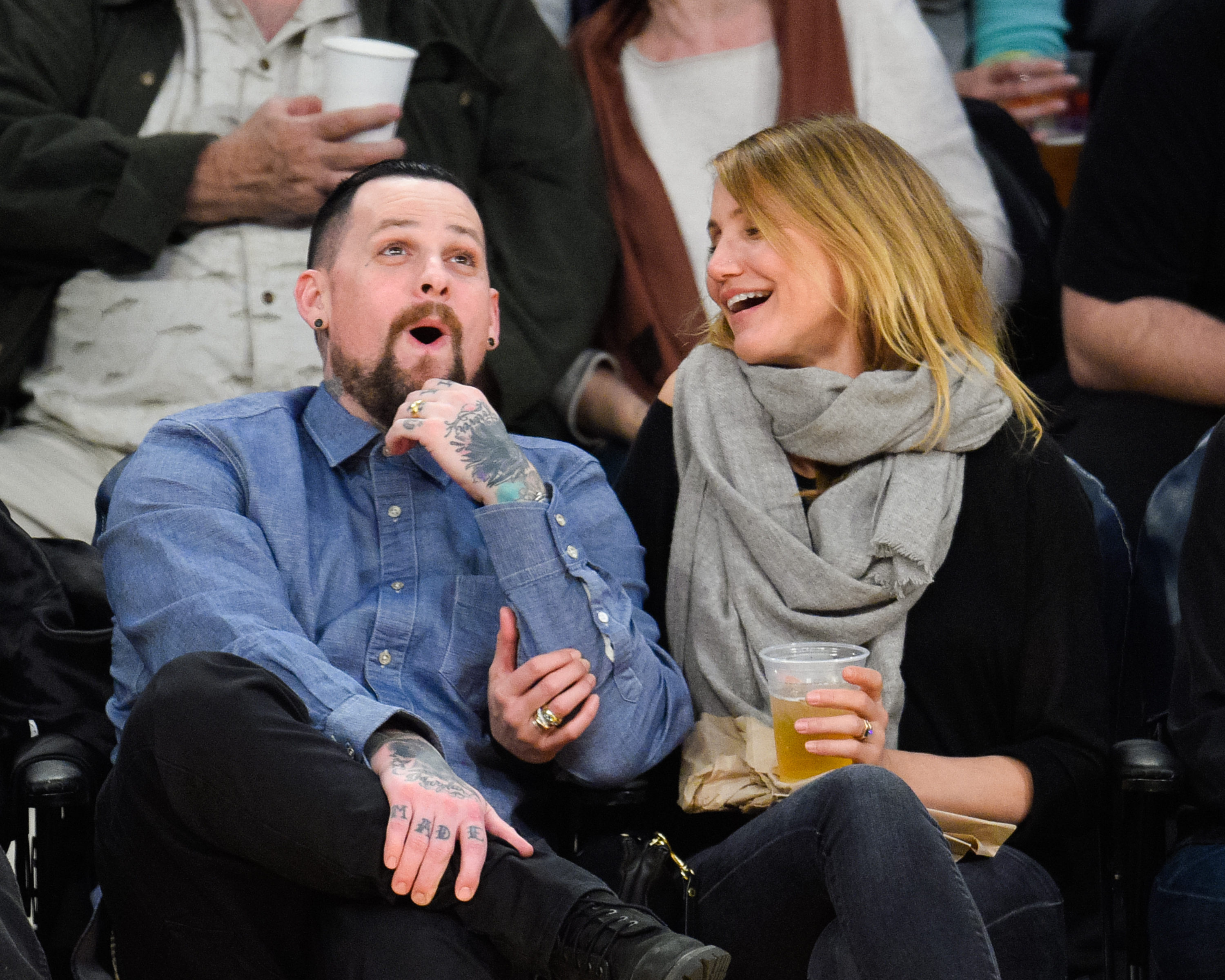 Just weeks after saying "I do," Cameron Diaz and Benji Madden were spotted courtside at the Staples Center in Los Angeles on January 27. The actress laughed with her new husband as the pair watched the Lakers take on the Washington Wizards, looking every inch the carefree couple in the glow of newlywed life.