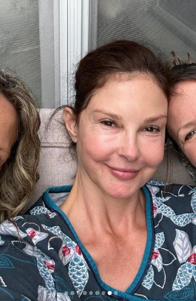 With her hair pulled back, Judd smiles directly at the camera, revealing fine lines around her eyes and subtle texture across her cheeks. The close-up offers a more natural-looking view of her facial features than the professionally lit event portraits. | Source: Instagram/ashley_judd