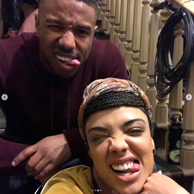 Michael B. Jordan and Tessa Thompson poking their tongues out and pulling funny faces while on the set of a "Creed" movie. | Source: Instagram/tessamaethompson