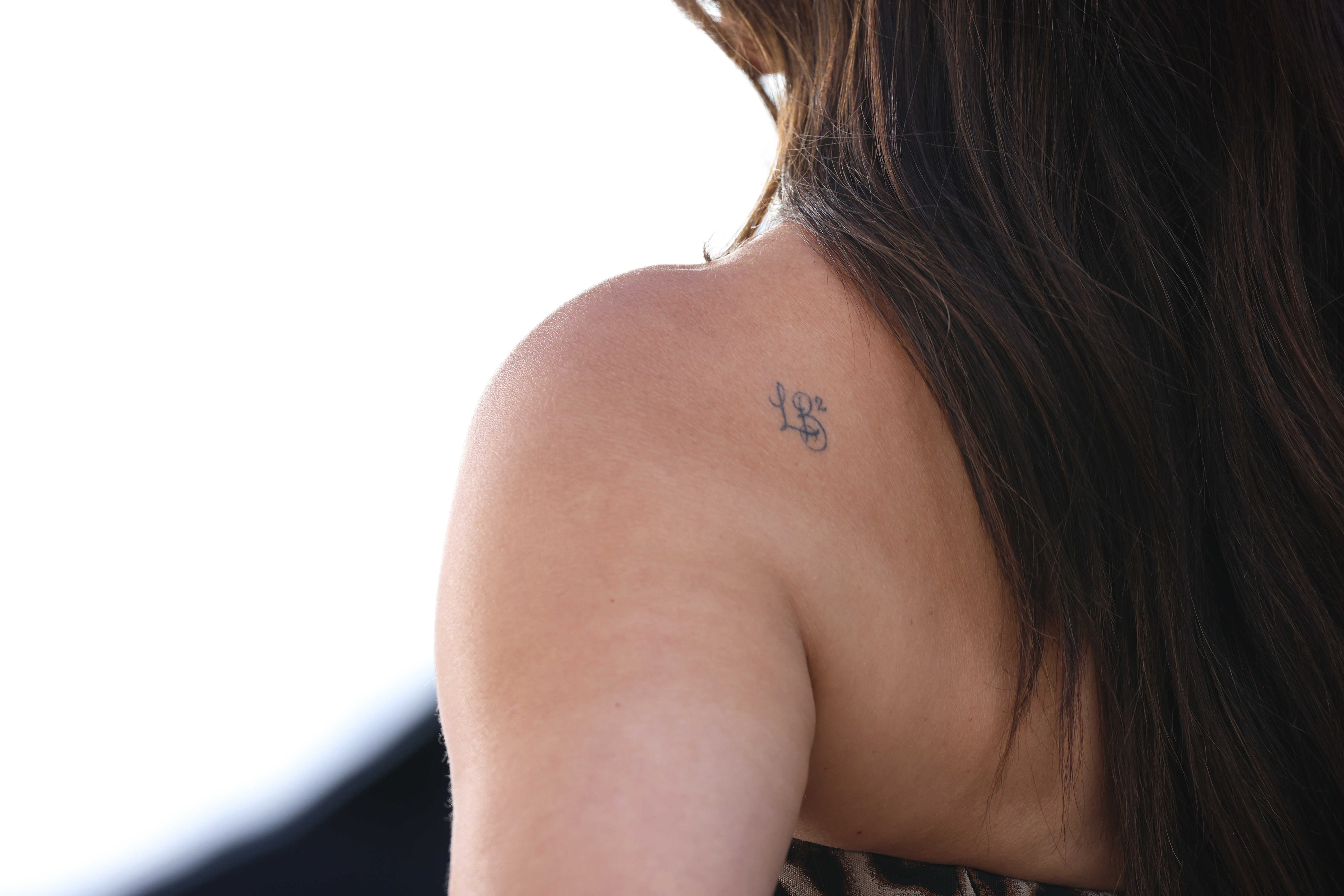 Bullock's newest visible change carried a meaning far more personal than the online chatter surrounding her appearance. Her representative confirmed that "LB2" honors her two children, Louis and Laila.