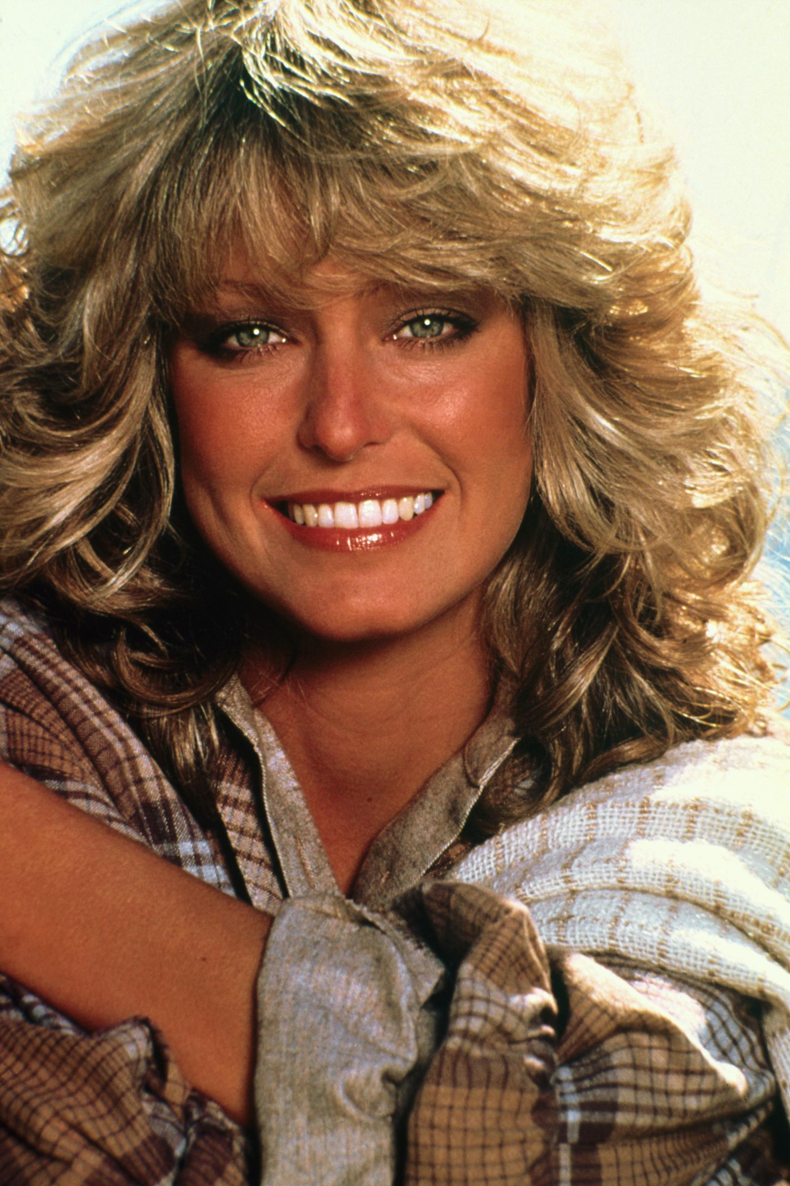 "Charlie's Angels" actress and model Farrah Fawcett smiles for the camera, on February 4, 1978. | Source: Getty Images