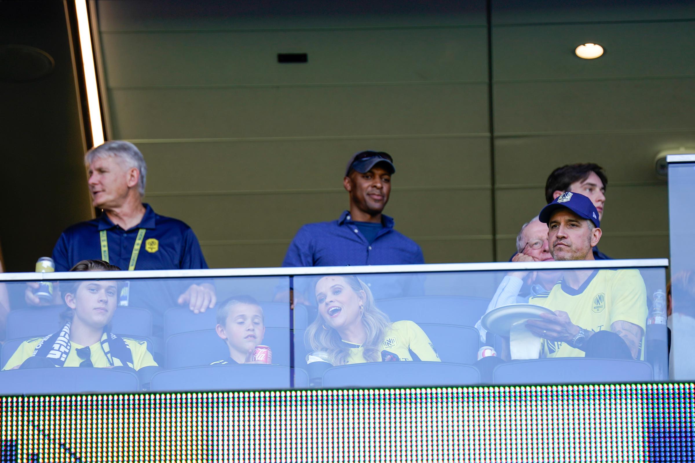 Reese Witherspoon watches Nashville SC's home opener with Deacon Phillippe, Tennessee Toth, and Jim Toth from a suite at GEODIS Park in Nashville. | Source: Getty Images
