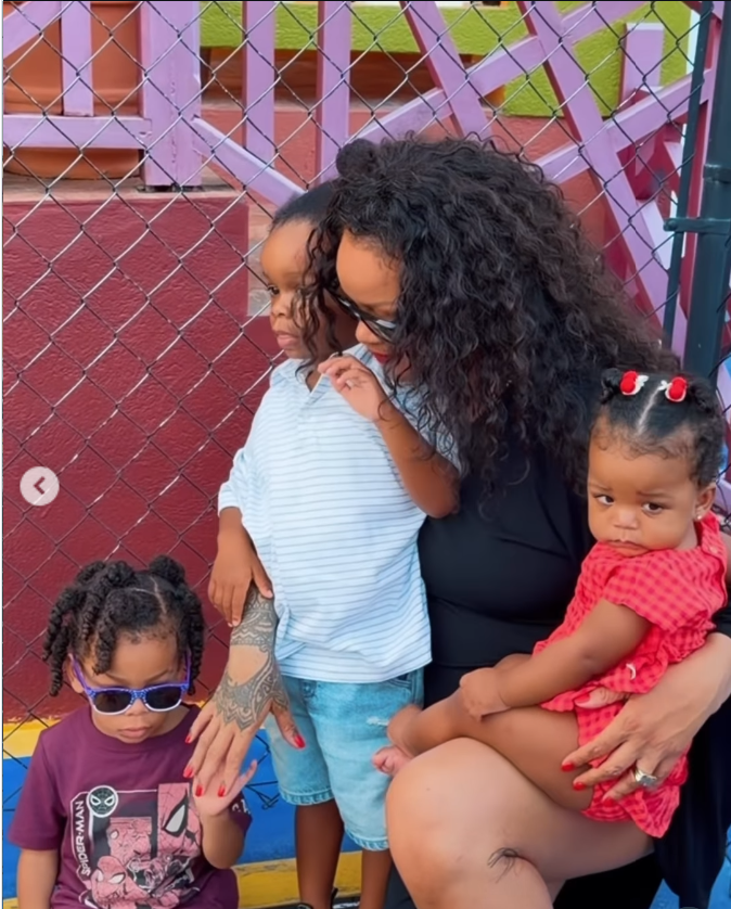 Rihanna poses with RZA, Riot and Rocki during the family's Barbados outing as fans debate which parent the children resemble most. | Source: Instagram/badgalriri