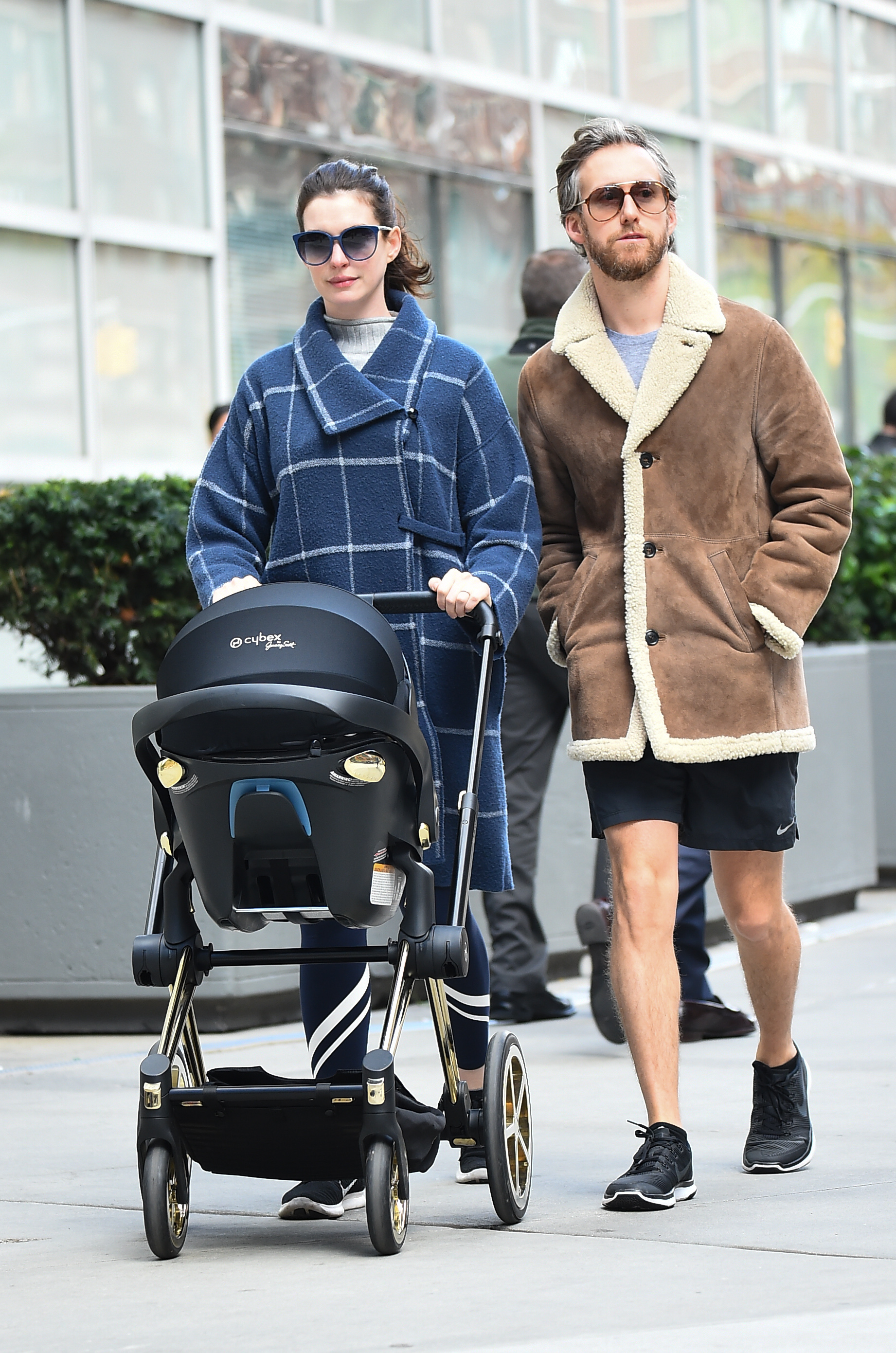 Anne Hathaway, Adam Shulman, and their son Jonathan in New York City, October 2016