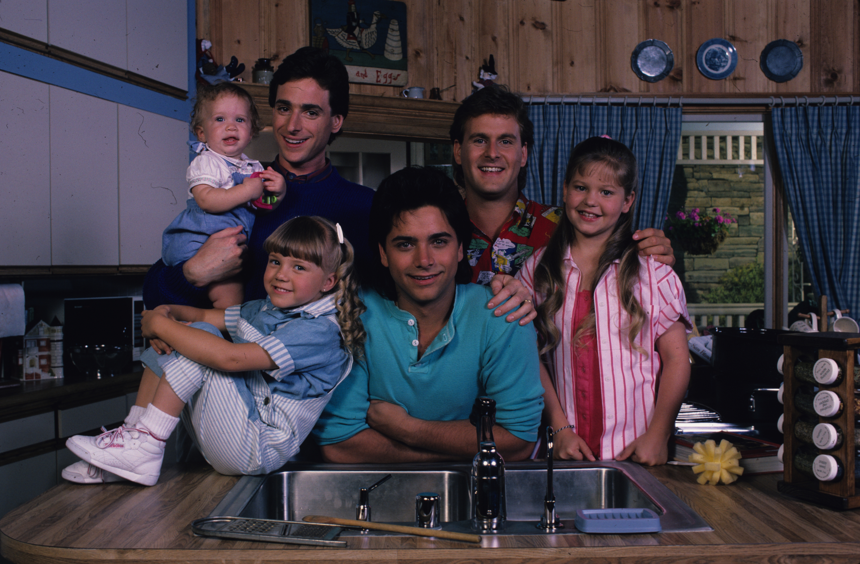 The Tanner household quickly became one of television's most recognizable homes, with Danny, Joey, and Jesse raising the three girls together. Decades later, the cast's enduring bond remains one of the reasons fans continue following their lives long after "Full House" ended. | Source: Getty Images