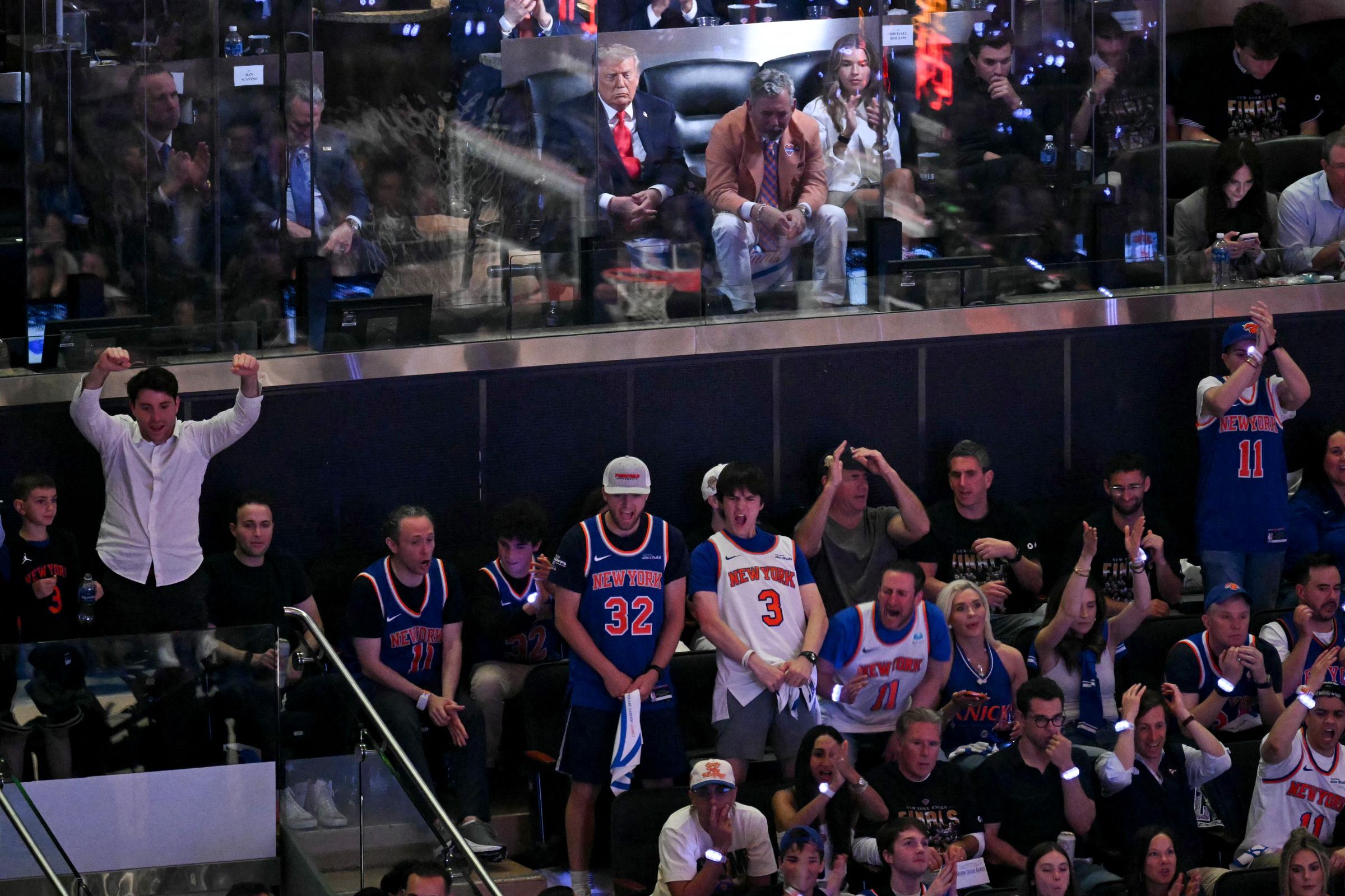 Donald Trump sits courtside with Knicks owner James Dolan and granddaughter Kai Trump during Game 3 of the NBA Finals. After New York's loss, Stephen A. Smith jokingly suggested the president's presence had disrupted the team's momentum. | Source: Getty Images