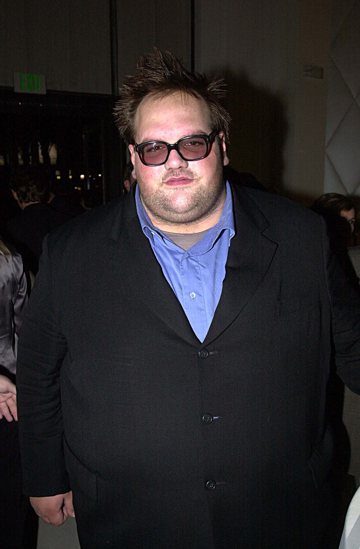 Ethan Suplee attended an event for the science-fiction comedy "Evolution" on June 1, 2001, during a period when his weight was near its highest point. Wearing glasses, a blue shirt, and a dark jacket, the actor posed for cameras — sporting a much different appearance from the one he would have in later years. Around this time, Suplee weighed more than 500 pounds and was beginning a long, complicated journey with his health.