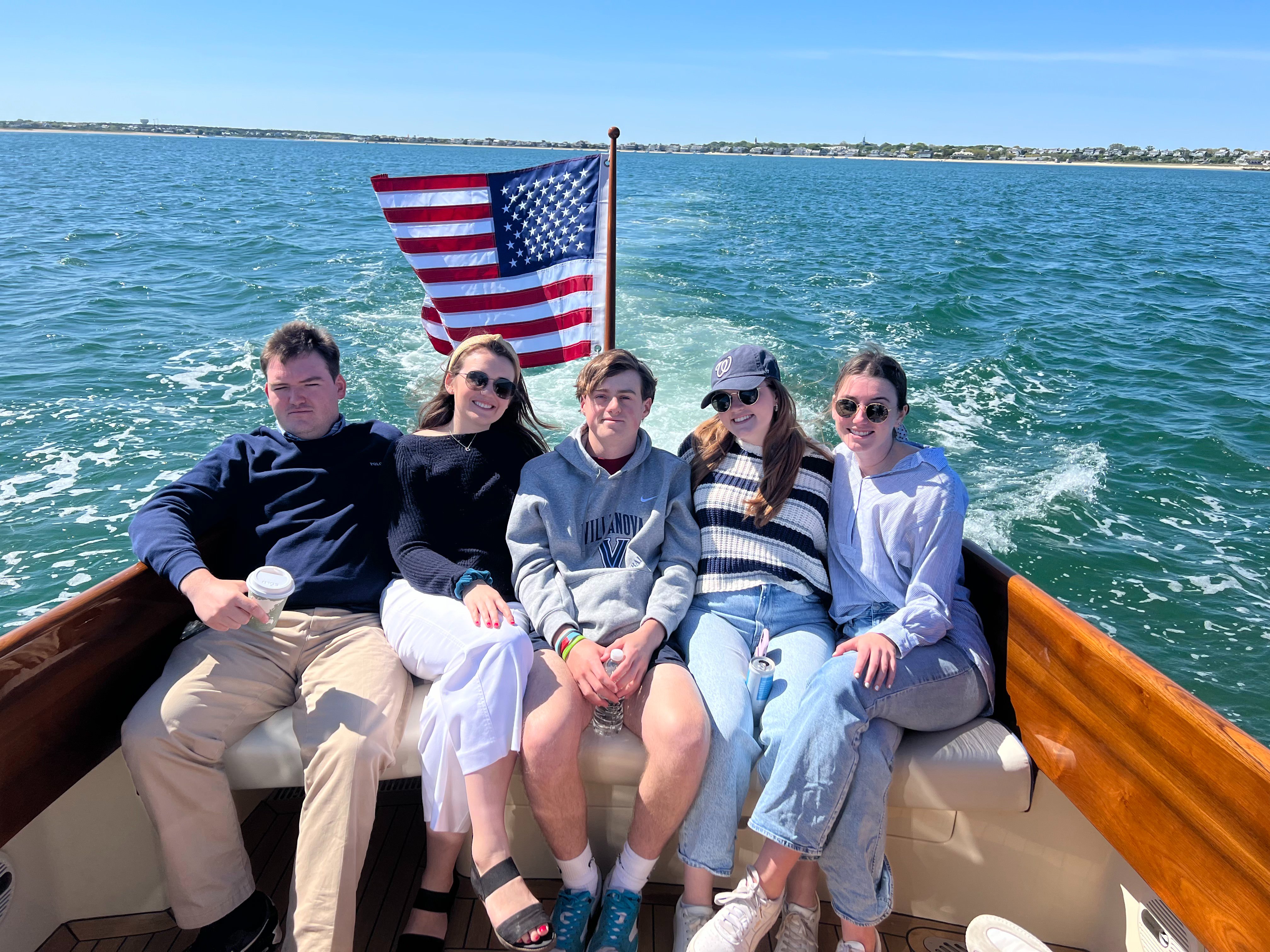 Erin and friends on a boat ride in a photo posted to the fundraiser. | Source: GoFundMe