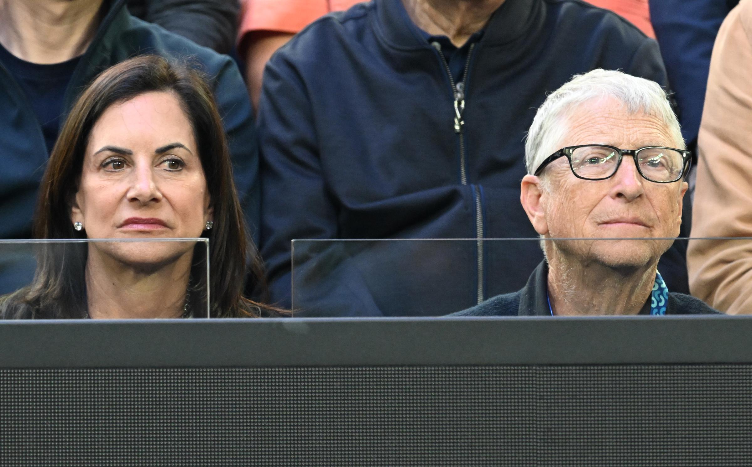 Bill Gates and Paula Hurd watch Carlos Alcaraz of Spain play Novak Djokovic of Serbia in the Men's Singles Final during day 15 of the Australian Open at Melbourne Park on February 1, 2026, in Melbourne, Australia | Source: Getty Images