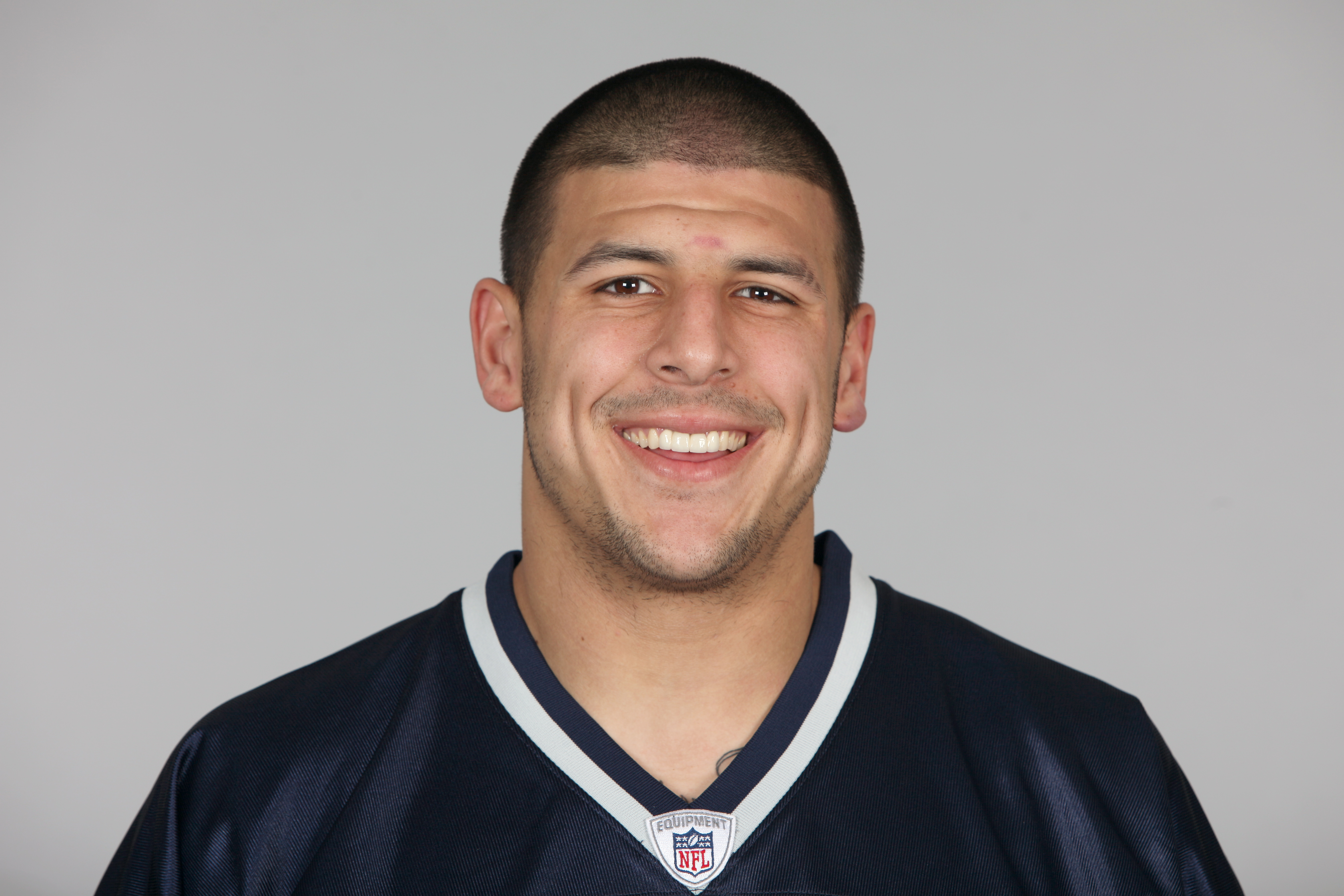 Aaron Hernandez smiled for his official 2010 NFL headshot in Foxborough, Massachusetts, during his first year with the New England Patriots. The portrait captured the young tight end near the beginning of a professional career that would later be overshadowed by his conviction for Odin Lloyd's murder and his death in 2017. Years later, netizens would point to Aaron's smile and other facial features when commenting on his resemblance to his daughter, Avielle Hernandez.
