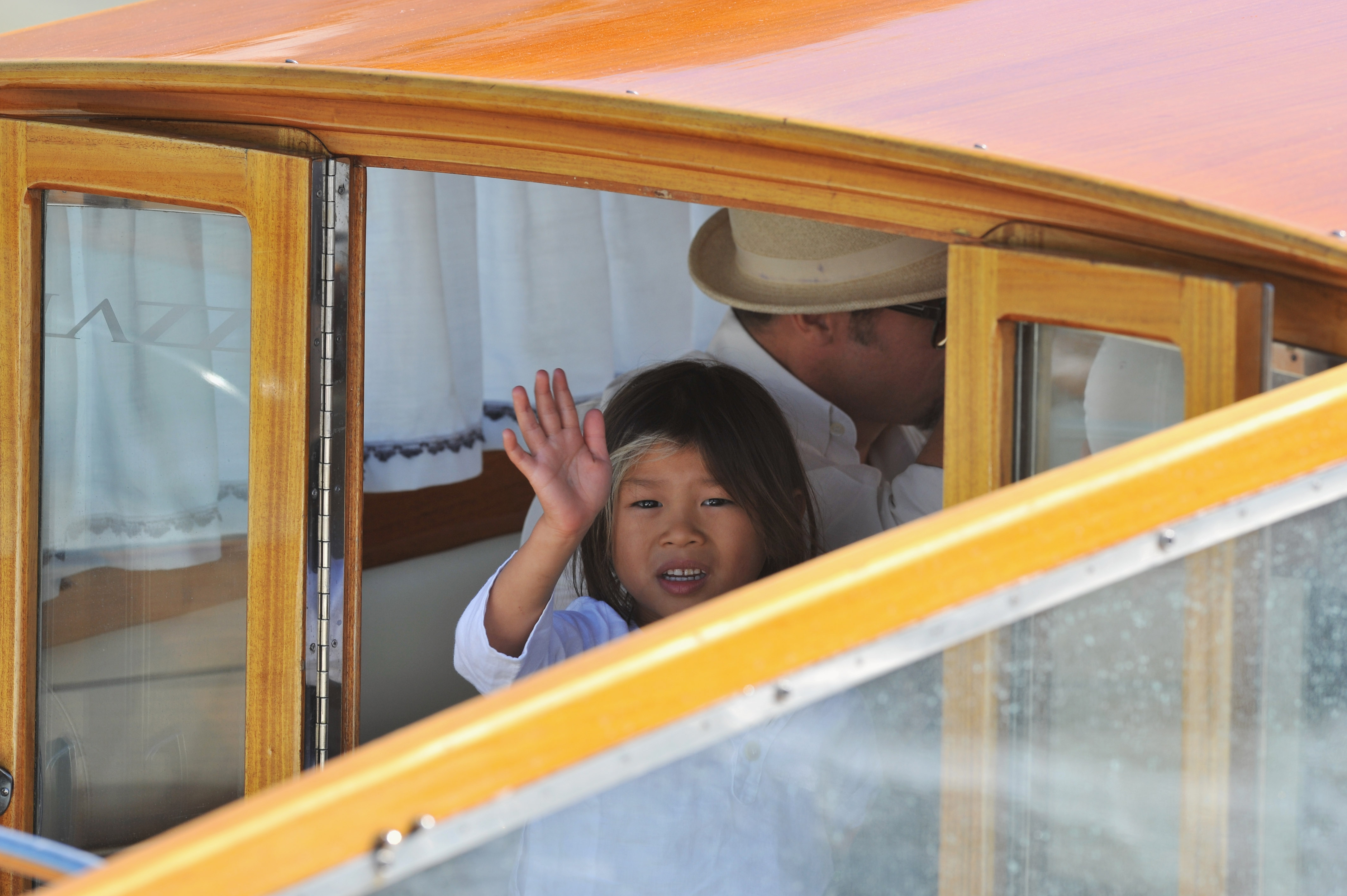 Before he was photographed on the pickleball court with Angelina, Pax was a young child traveling with the Jolie-Pitt family. This early image makes the recent charity outing a reminder of how much time has passed. | Source: Getty Images