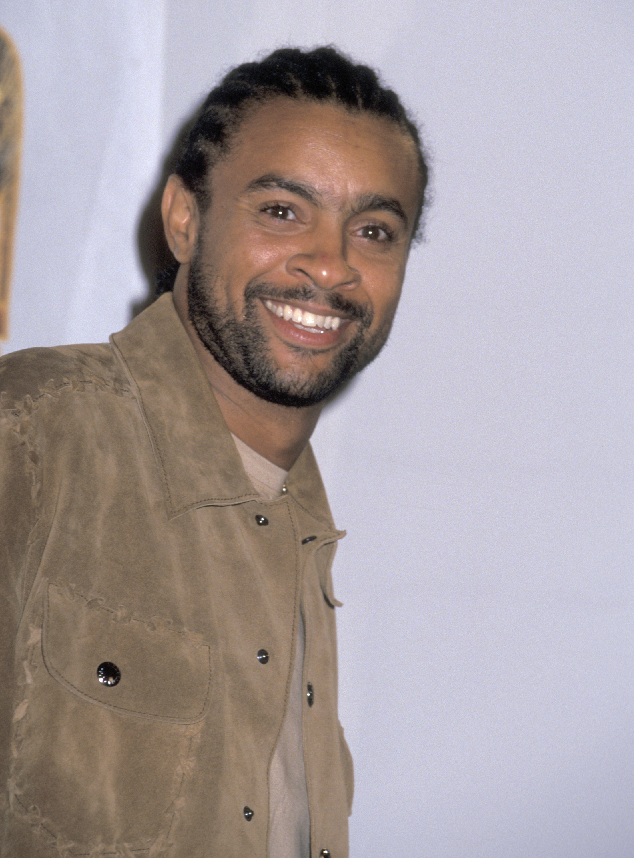 Shaggy turns toward the camera with a broad smile while attending the 15th Annual Soul Train Music Awards in Los Angeles on February 28, 2001 | Source: Getty Images