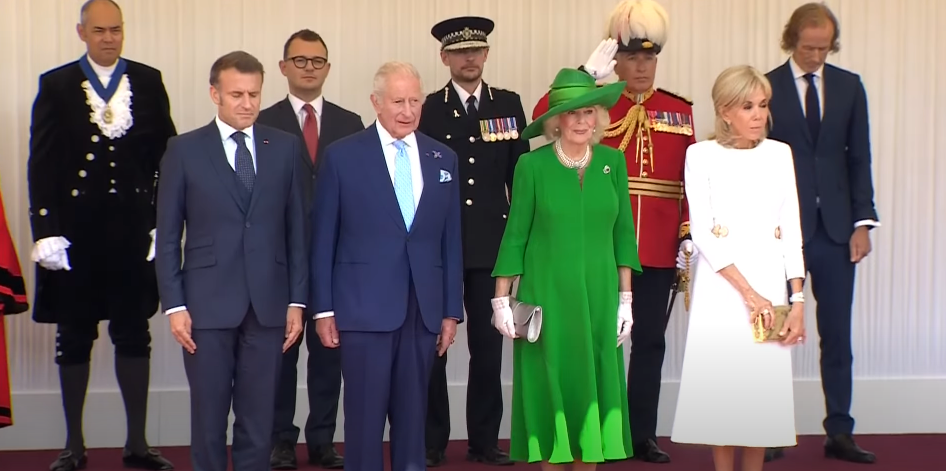 French President Emmanuel Macron, King Charles III, Queen Camilla, and Brigitte Macron standing in formation for the French National Anthem at Windsor on July 8, 2025 | Source: Youtube/The Royal Family Channel