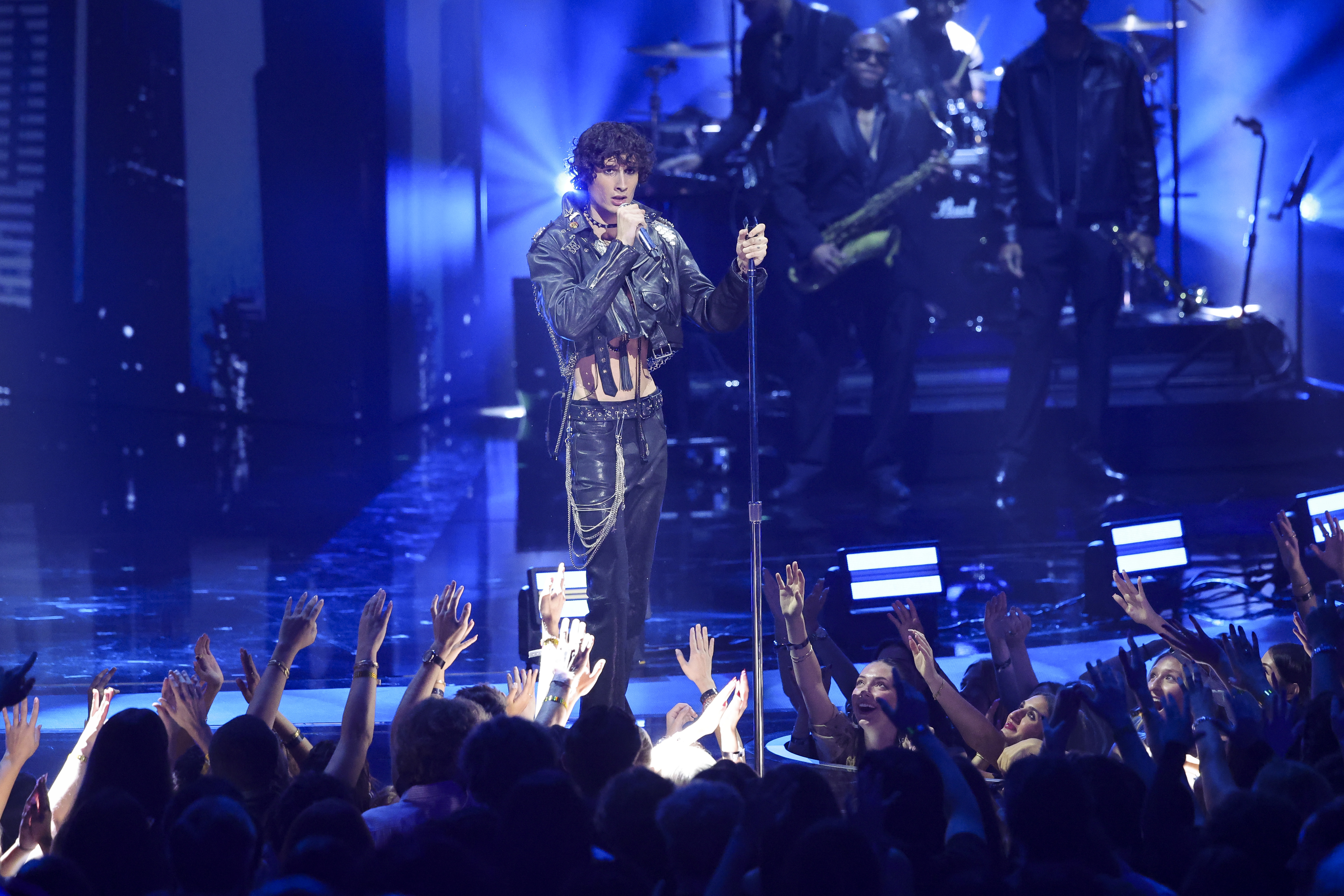 Sombr performs during the George Michael tribute at the 2026 MTV Video Music Awards, where his renditions of "Faith" and "Father Figure" drew divided reactions from viewers. | Source: Getty Images
