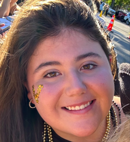 Sheridan Gorman smiling warmly for a photo, posted in March 2026. | Source: Inclusive Funeral Care