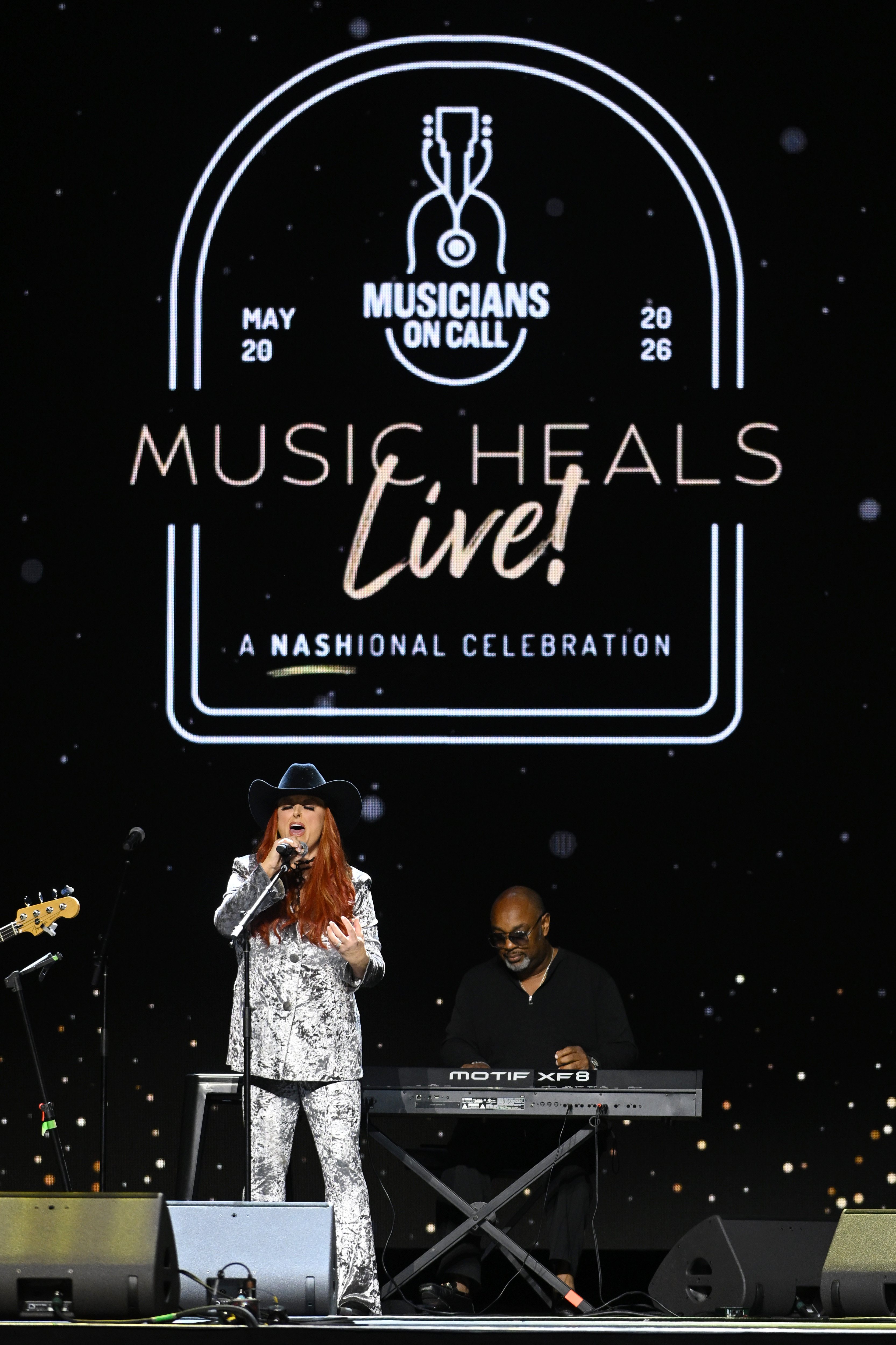 Wynonna was photographed outside ABC Studios in New York City on October 5, wearing a flowing burgundy top, black pants, and sunglasses. The street-style image showed her transformation in an everyday setting rather than under concert lights or on a formal red carpet.