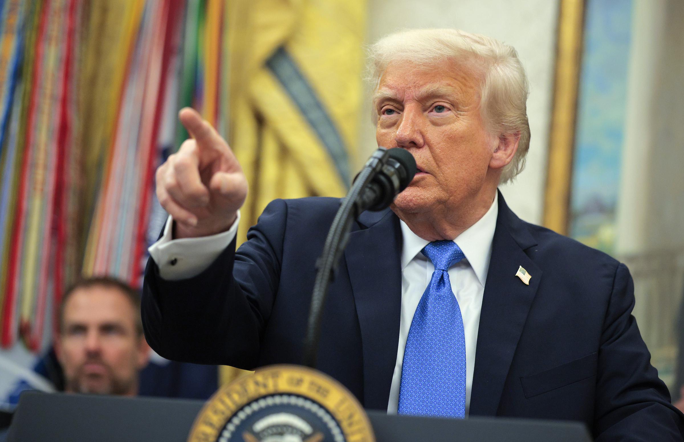 US President Donald Trump speaking before posthumously awarding Medals of Sacrifice to three fallen Palm Beach County Sheriff's Office deputies in Washington, D.C., on May 19, 2025. | Source: Getty Images