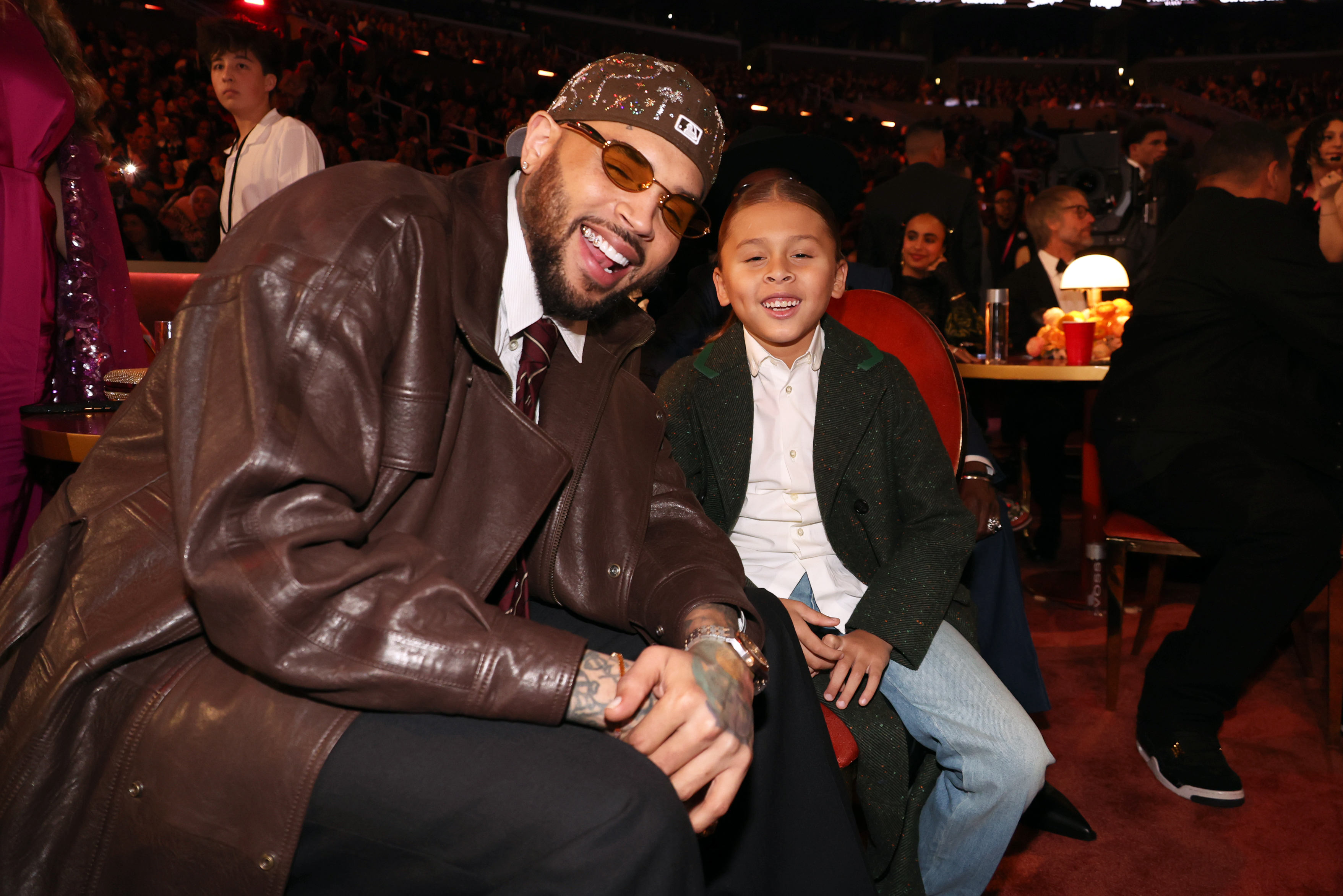 Chris and Aeko Brown smiling inside the venue of this year's GRAMMYs. | Source: Getty Images