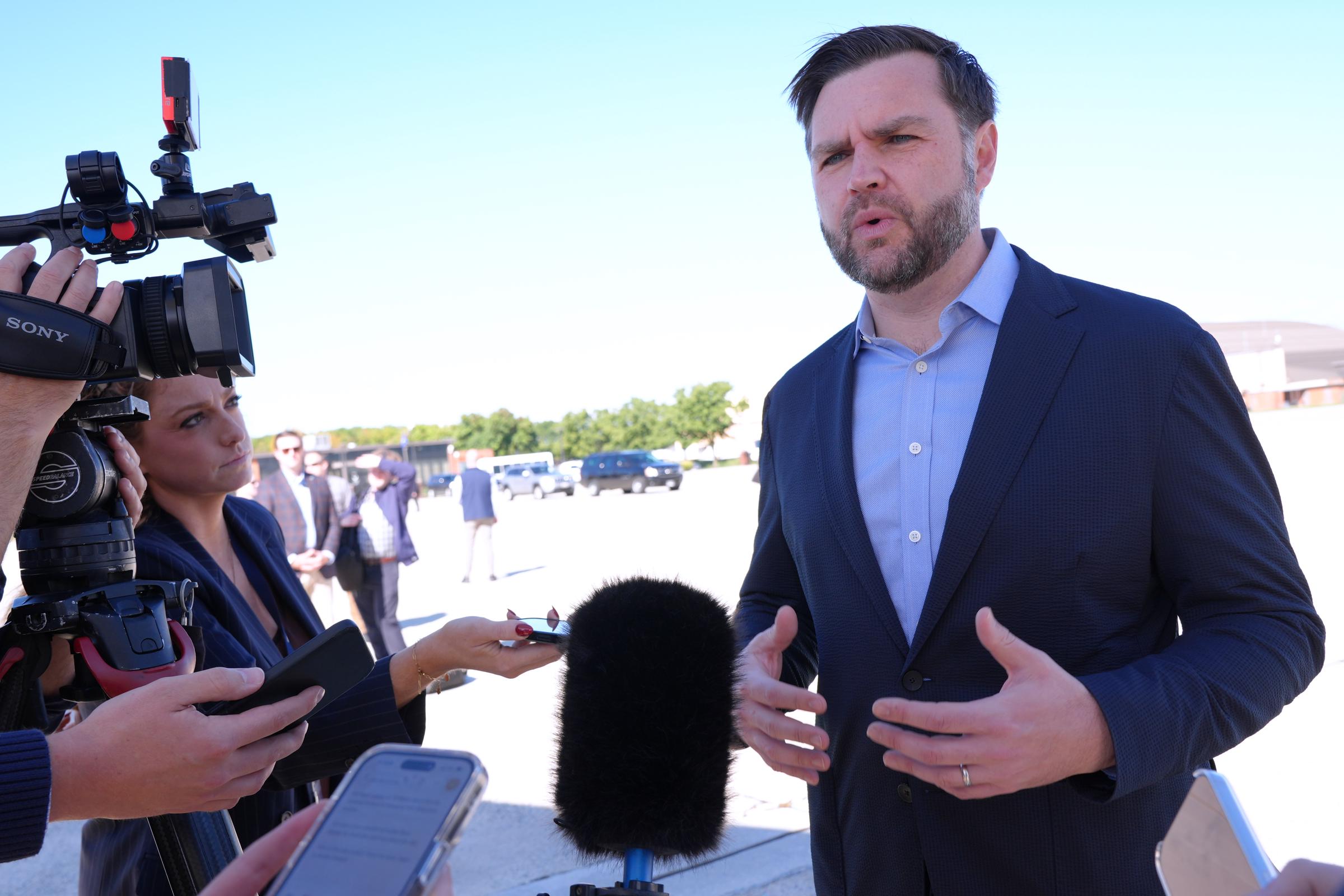JD Vance speaks to reporters before boarding Air Force Two on October 5, 2026 at Joint Base Andrews, Maryland. | Source: Getty Images