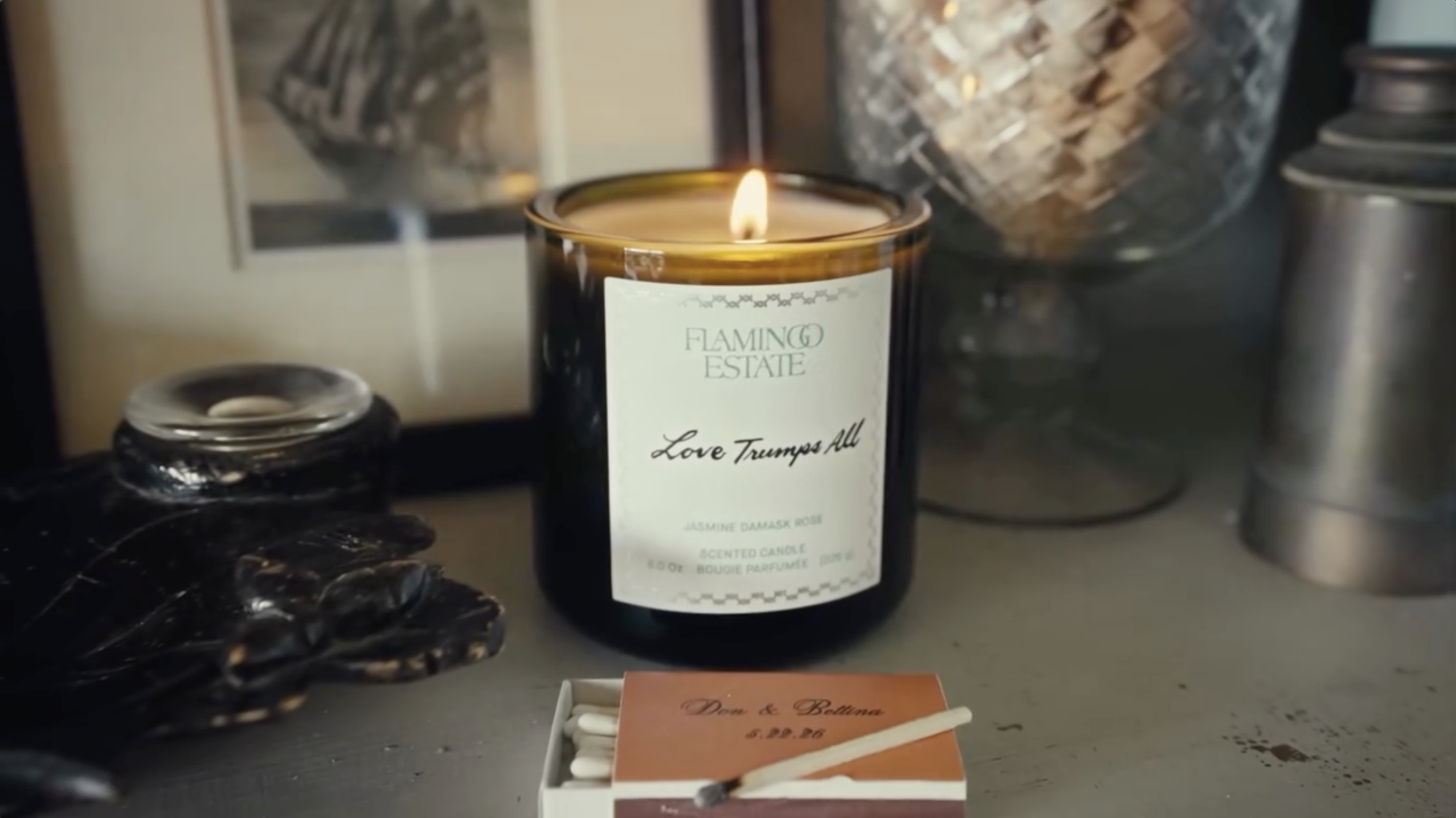 A personalized candle and custom matchbox bearing Donald Trump Jr. and Bettina Anderson's names are arranged before the celebration. | Source: Instagram/donaldjtrumpjr