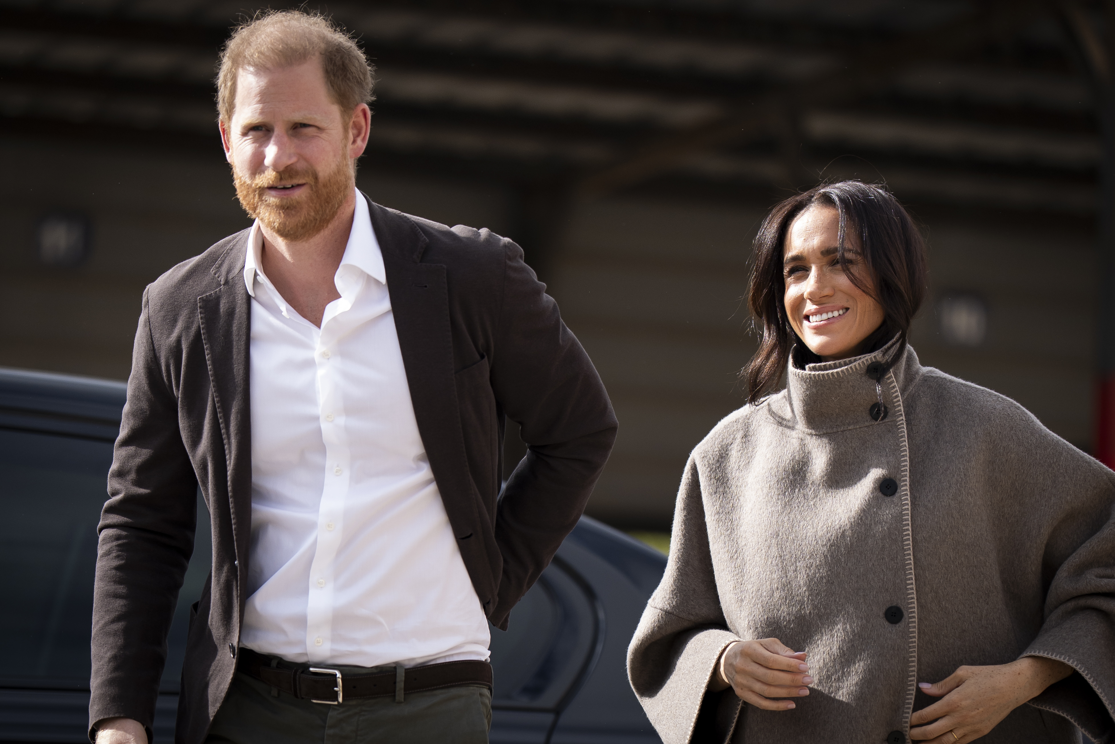 Prince Harry and Meghan Markle arrive for a visit to the National Centre for Rehabilitation of Addicts in Amman, Jordan, in February 2026. Their return to Britain later that year did not change their status as non-working members of the royal family | Source: Getty Images