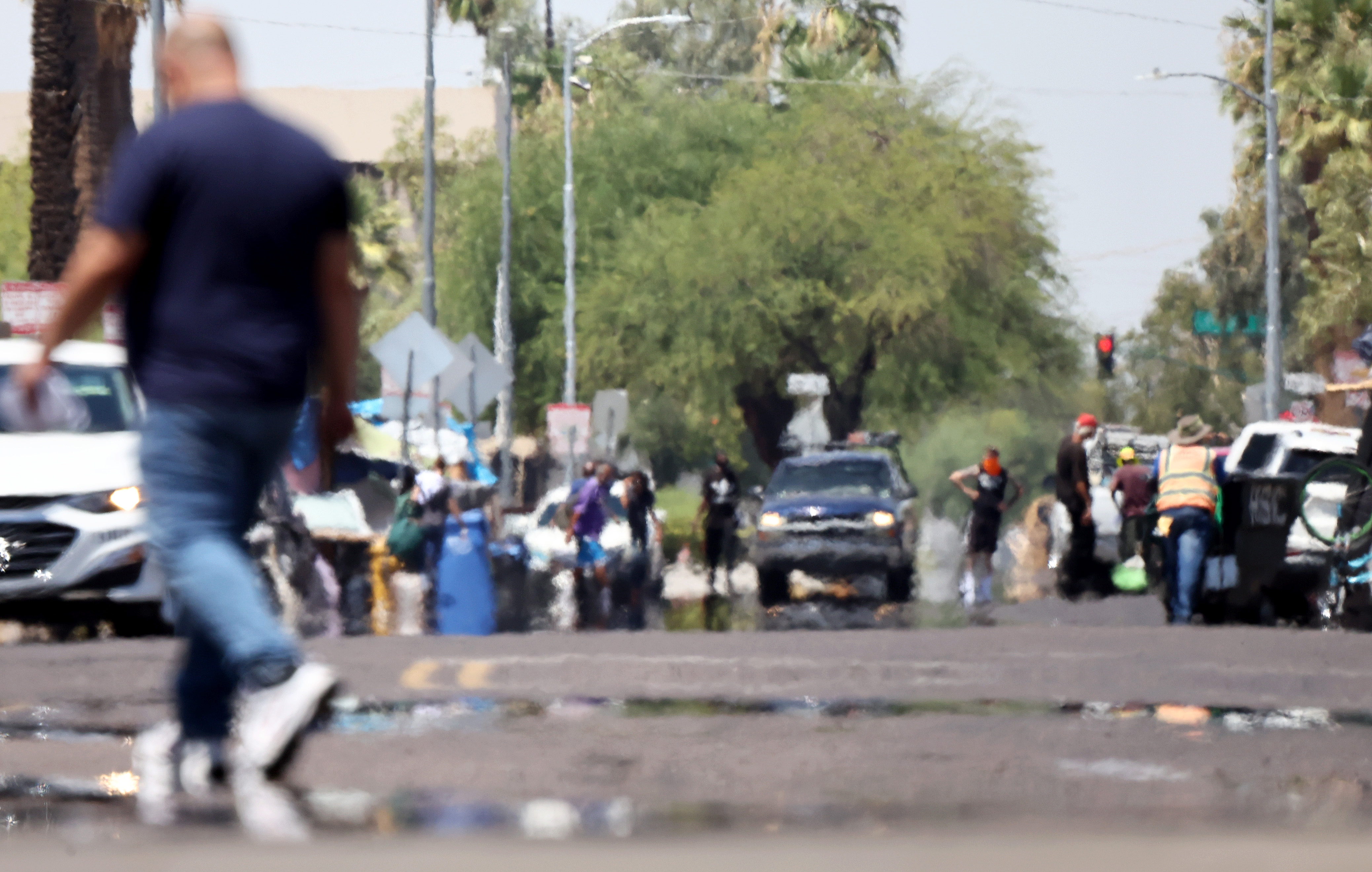 Heat shimmer distorts the view along a street in Phoenix, Arizona, during dangerously high temperatures on July 25, 2023 | Source: Getty Images