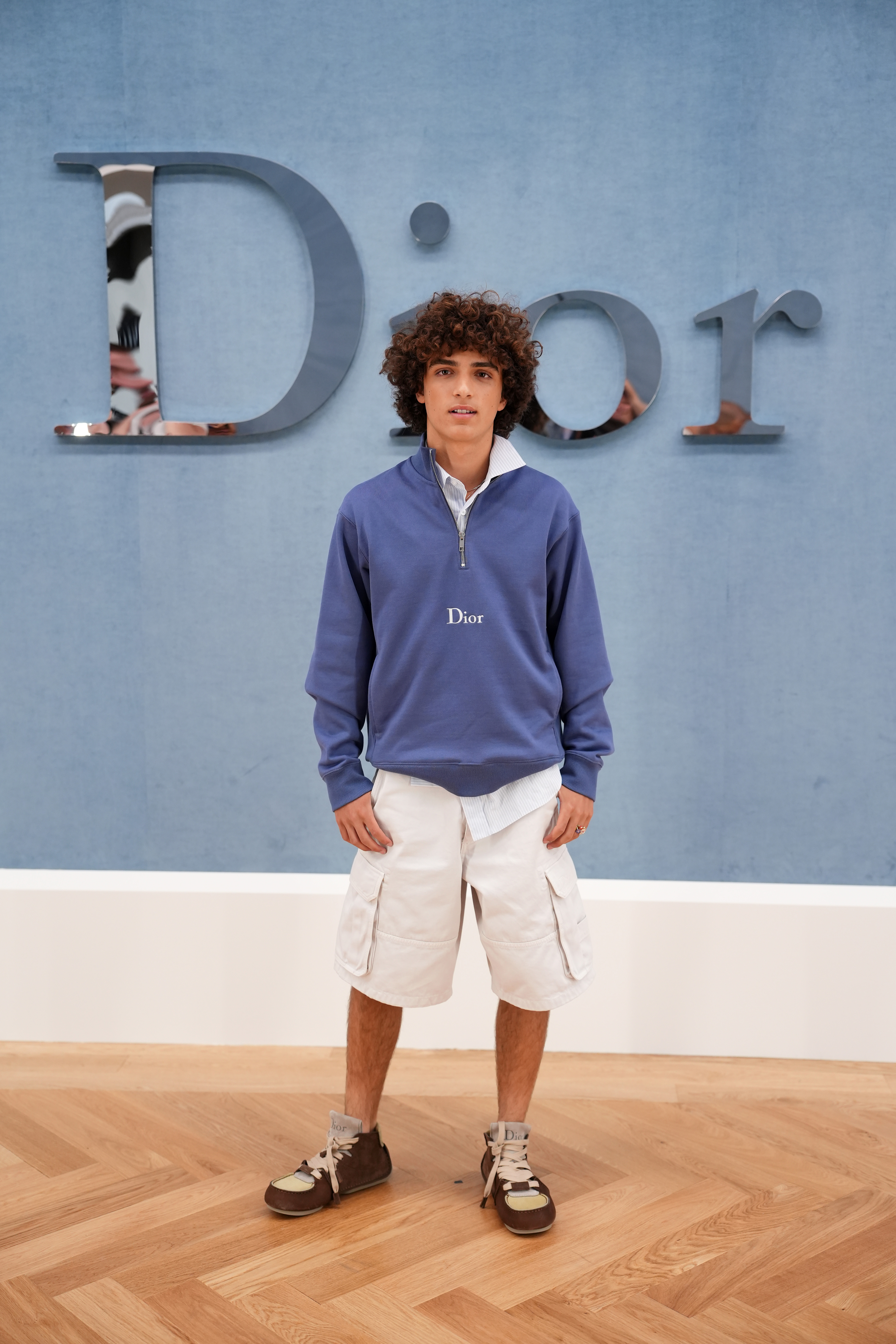 Levi McConaughey at the Dior Homme's Menswear Ready-to-wear Spring-Summer 2026 collection fashion show during Paris Fashion Week in Paris, on June 27, 2025. | Source: Getty Images