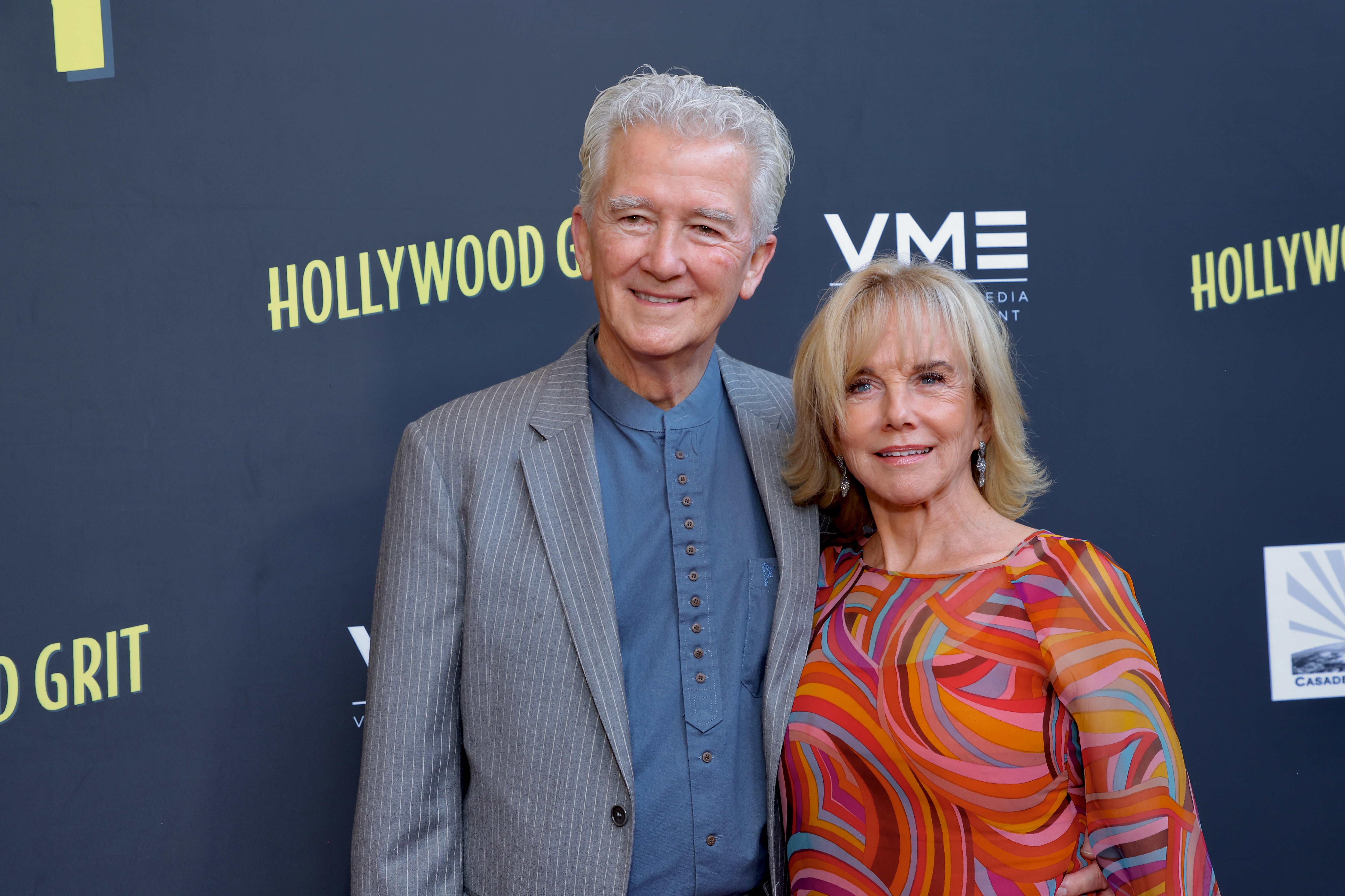 Posing beside partner Patrick Duffy on the red carpet for "Hollywood Grit" at The Grove on August 21, 2025, 69-year-old Linda Purl exuded vibrant poise. Her eye-catching dress in swirling ribbons of sunset orange, fuchsia, and gold paired effortlessly with soft, shoulder-grazing blonde waves, beautifully accentuating the radiant, graceful ease of her late 60s. | Source: Getty Images