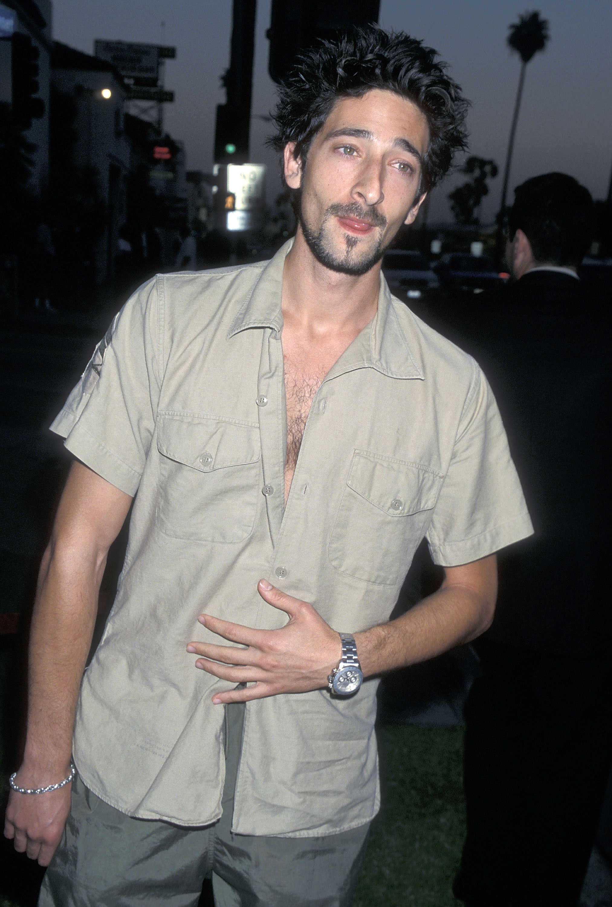 Adrien Brody stepped out for the Hollywood premiere of "The Big Kahuna" at the Harmony Gold Theatre in Hollywood, California, on April 26, 2000, wearing a loose-fitting short-sleeved shirt and sporting facial hair. Photographed before his preparation for "The Pianist," the actor still carried more weight than he would after losing about 30 pounds to reach 129 pounds for his portrayal of Władysław Szpilman.
