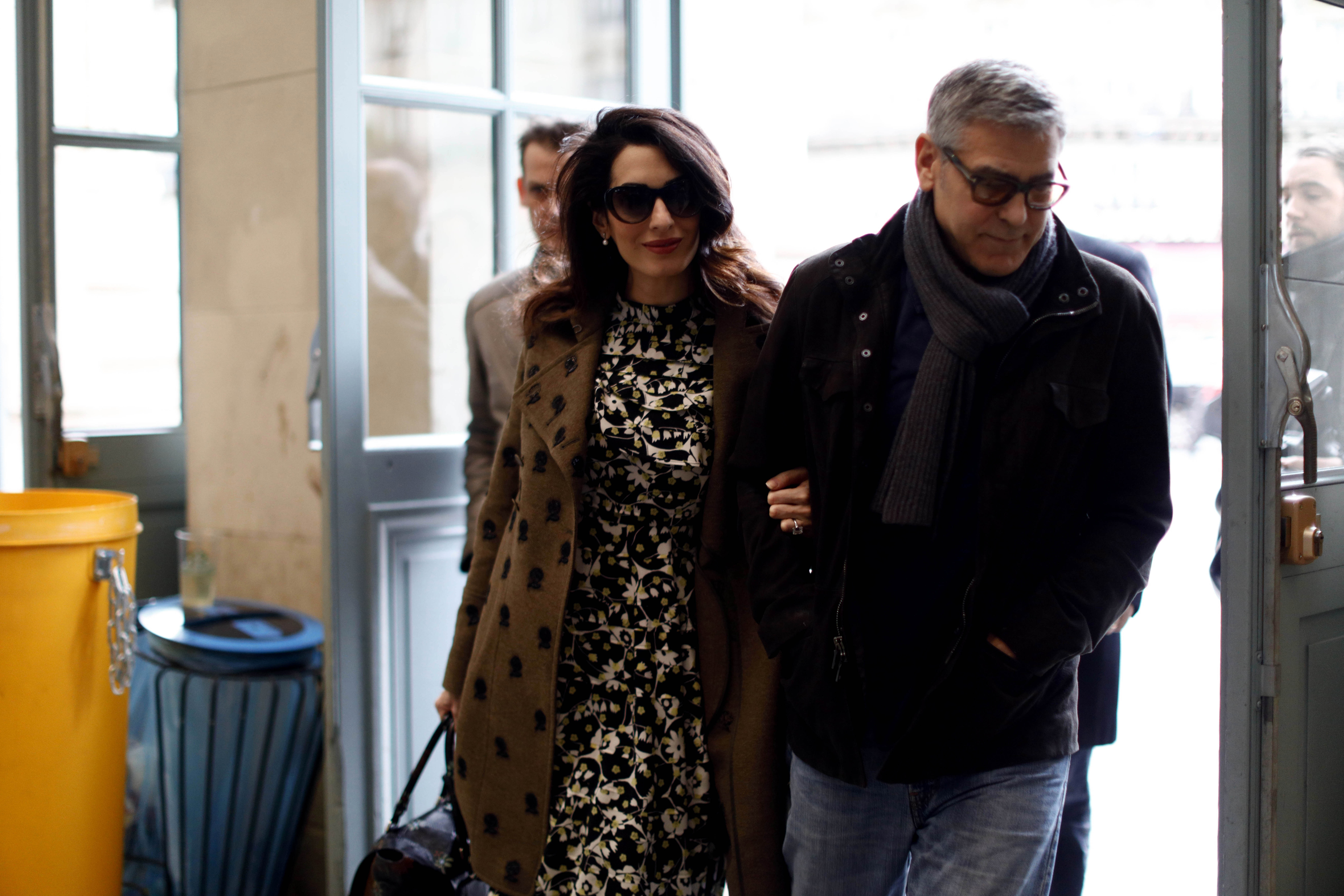 This Paris photo shows the couple in the year they became parents to Ella and Alexander. George later said he wanted their children to grow up without worrying about paparazzi or being compared to other famous kids. | Source: Getty Images