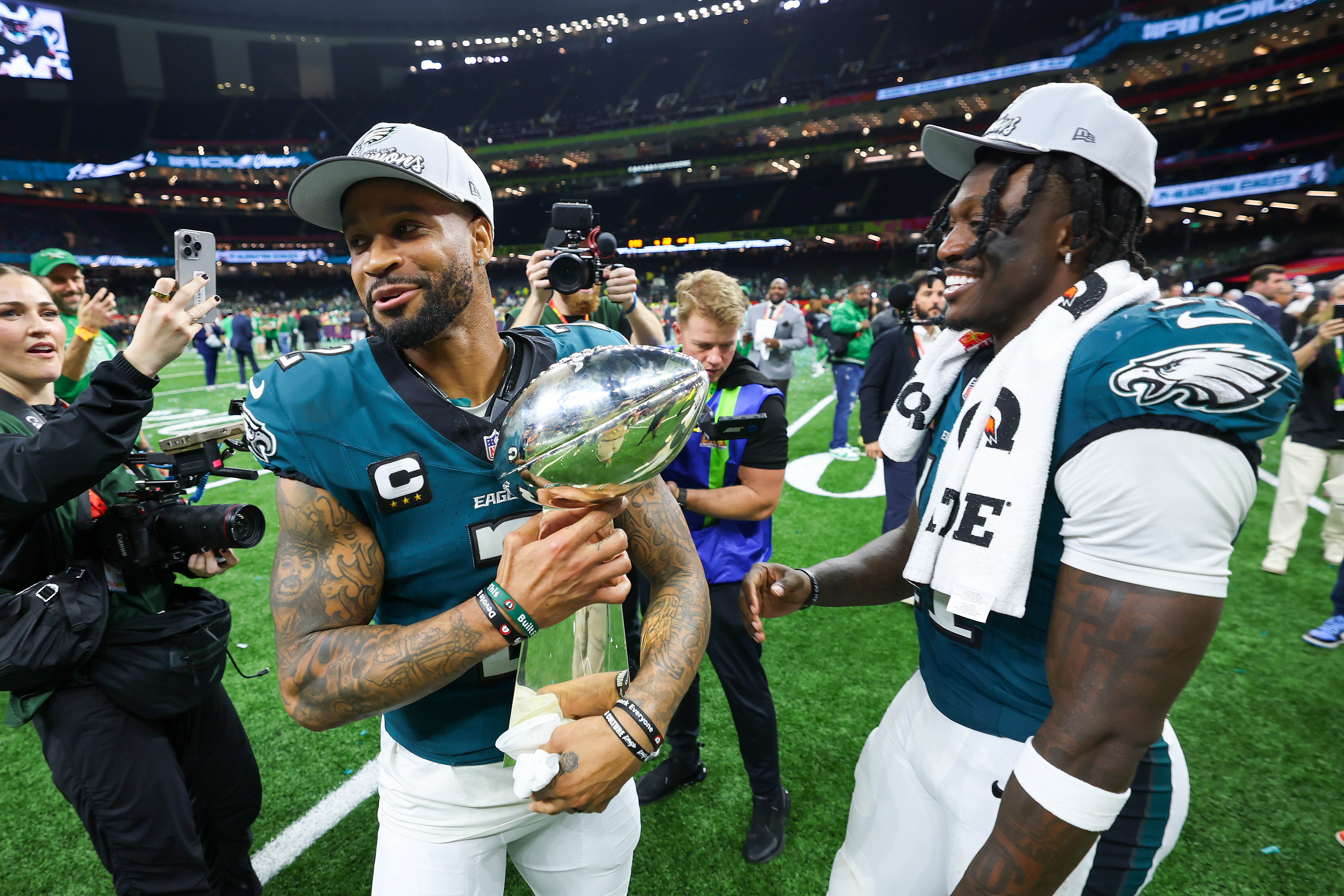 Darius Slay and A.J. Brown of the Philadelphia Eagles celebrate with the Vince Lombardi Trophy after beating the Kansas City Chiefs 40-22 to win Super Bowl LIX on February 9, 2025 | Source: Getty Images