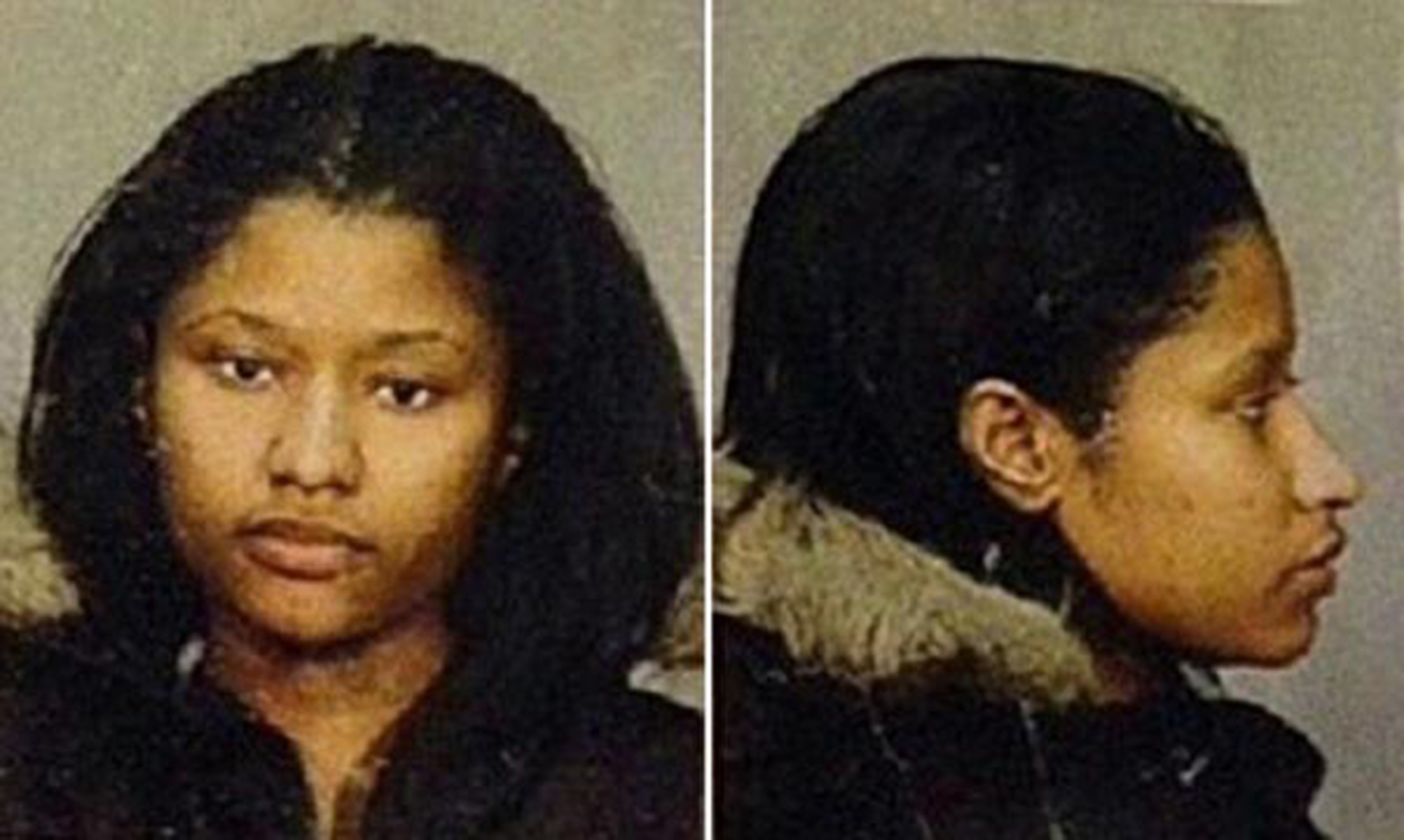 Nicki Minaj posing for her mugshot in December 2003. | Source: Getty Images