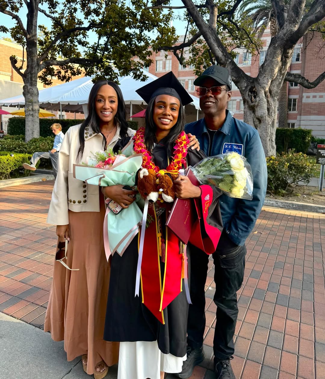 The actor poses with Malaak Compton and daughter Zahra Rock, from a post dated May 18, 2026 | Source: Instagram/malaak_compton_rock