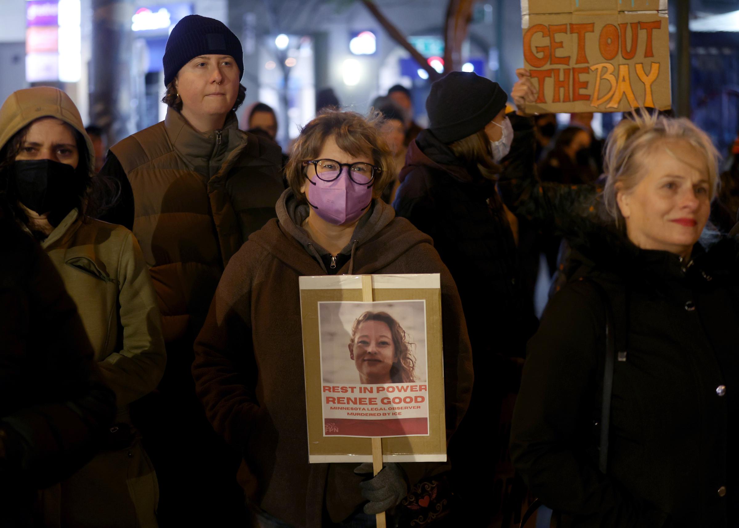 Protesters take part in a vigil for Renee Nicole Good at Fruitvale Plaza Park in Oakland, California, on January 7, 2026. | Source: Getty Images